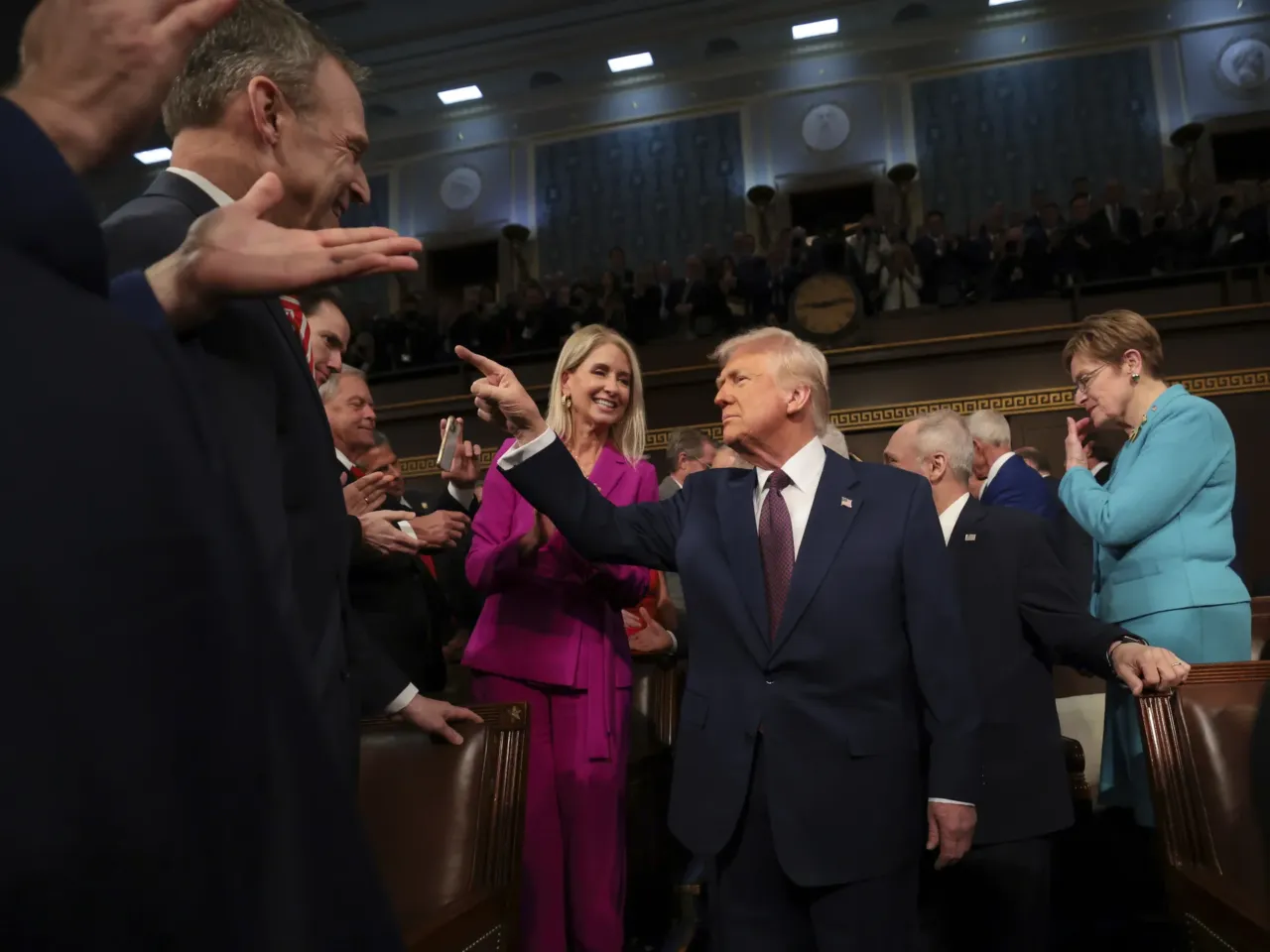 From cheers to protests, here's a look inside the chamber during Trump's speech 1 President Trump arrives to address a joint session of Congress at the Capitol.