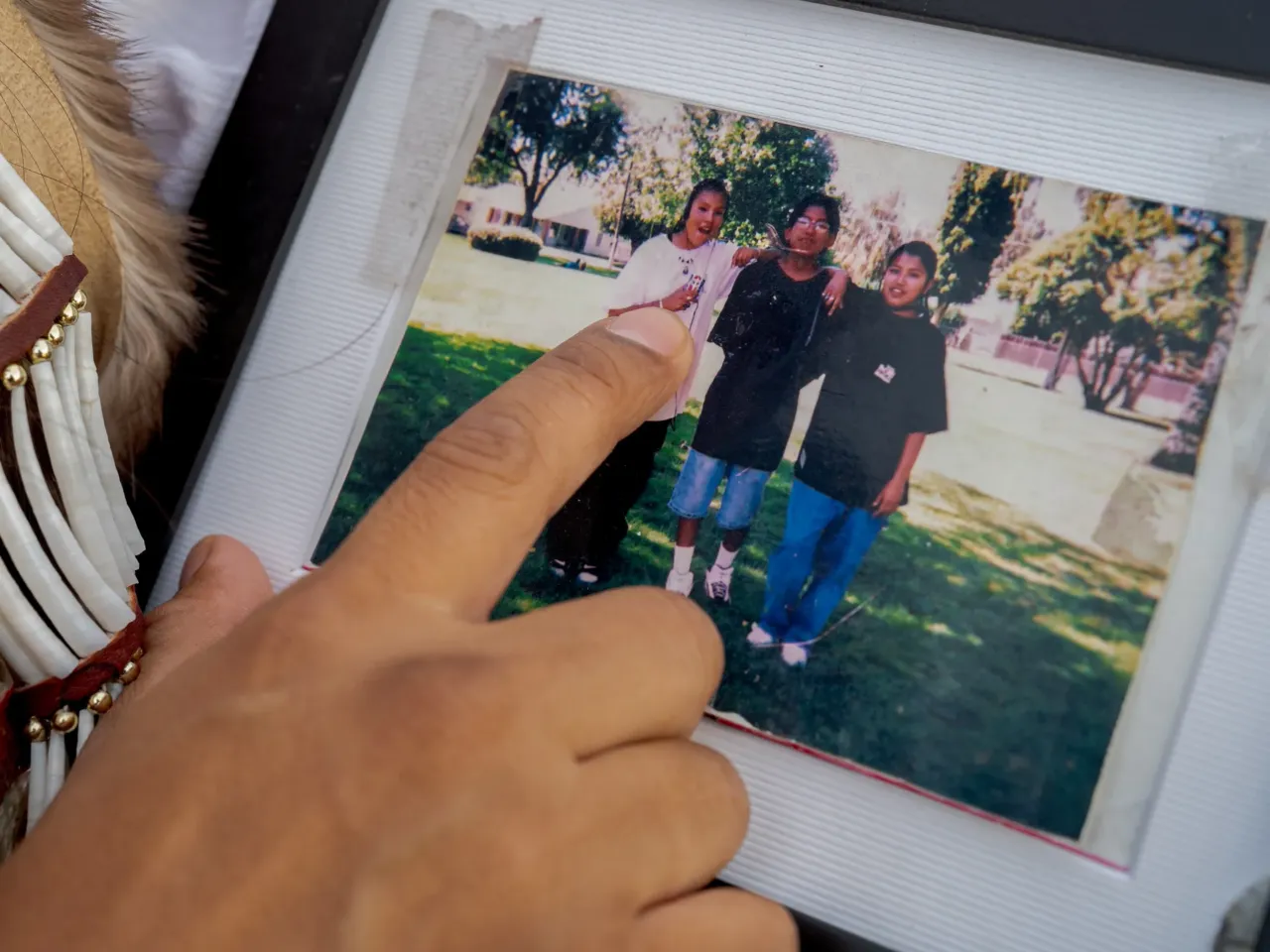 Benita Long disappeared. So why wasn't she added to this missing person database? 2 Loni Long holds an old family photo that shows (from left) Loni's sister Denise Long, Loni's cousin Vincent Wapato (who died in 1997) and Benita Long as teenagers on the Yakama Nation reservation.