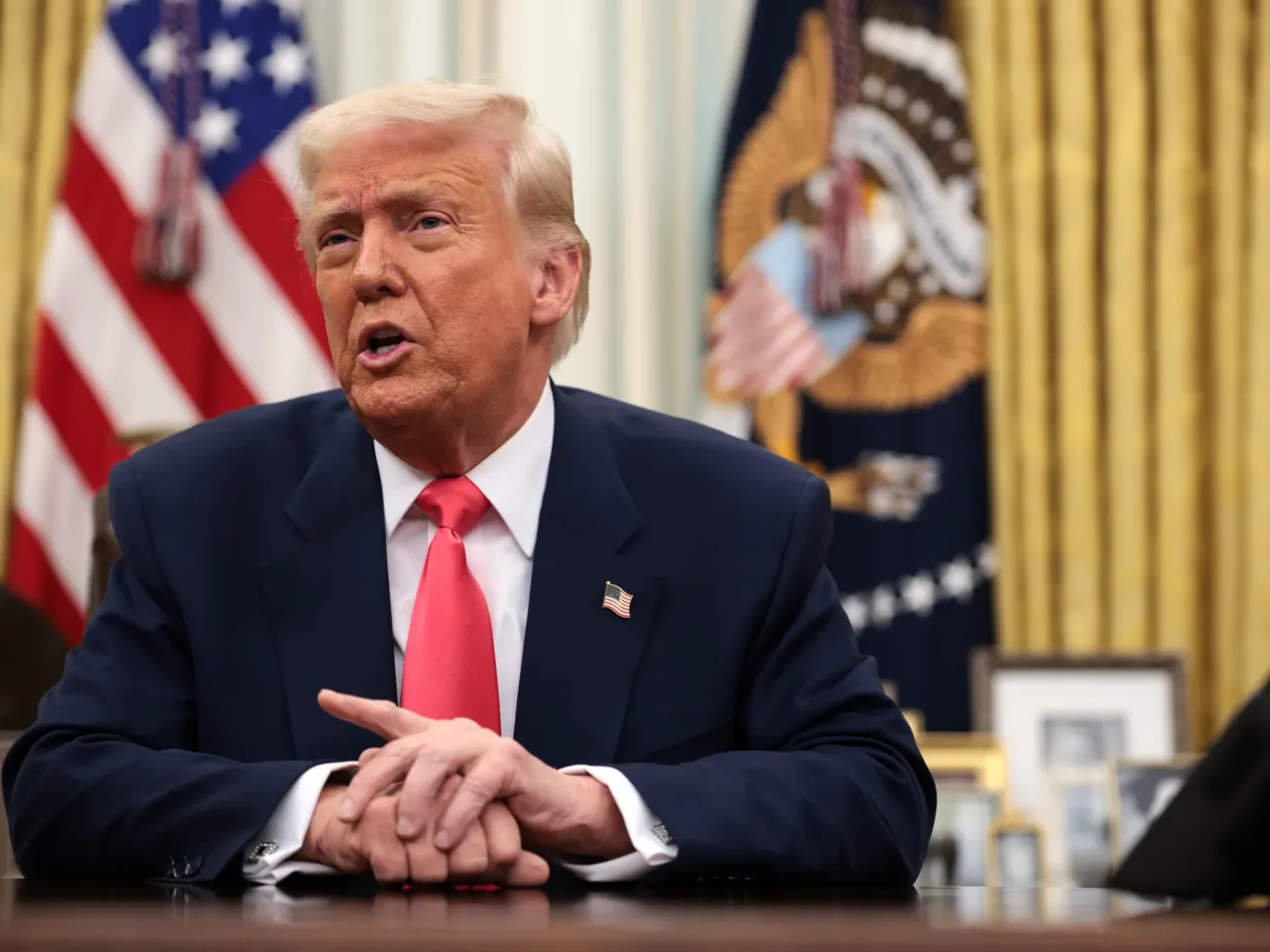 President Trump signed an executive order banning the government from hiring a law firm that represented Hillary Clinton's campaign in the 2016 presidential race.