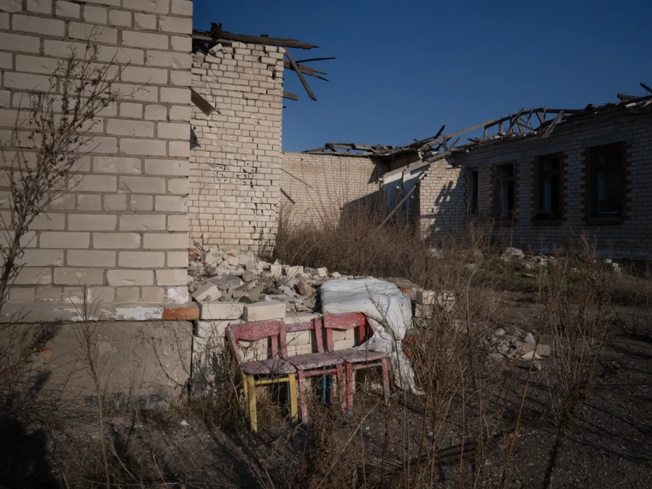 Ukrainians in front-line regions reel from losses, but say hope dies last for them 5 Children's chairs sit outside the remains of a school that was badly damaged in Posad-Pokrovske.