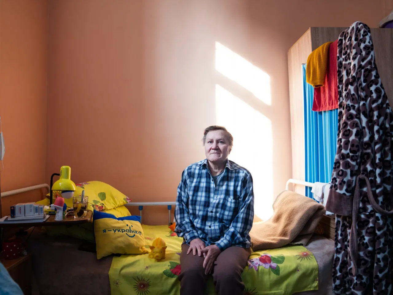 Ukrainians in front-line regions reel from losses, but say hope dies last for them 10 Halyna Zayceva sits on her bed at the ARTAK shelter, where she's been staying for the last six months since she was evacuated from Novohrodivka.