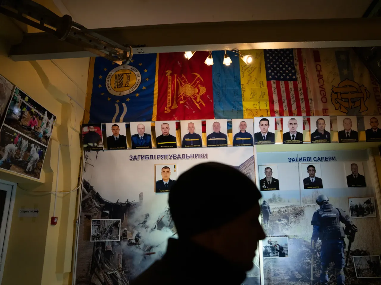Ukrainians face fears during the country's darkest nights 4 Lohinov stands in a small museum for Kharkiv firefighters, which was never opened to the public since it wasn't finished before the war began. Now it has a wall that is dedicated to those who have died on duty during the war, including Lohinov's father, Vladyslav Lohinov.