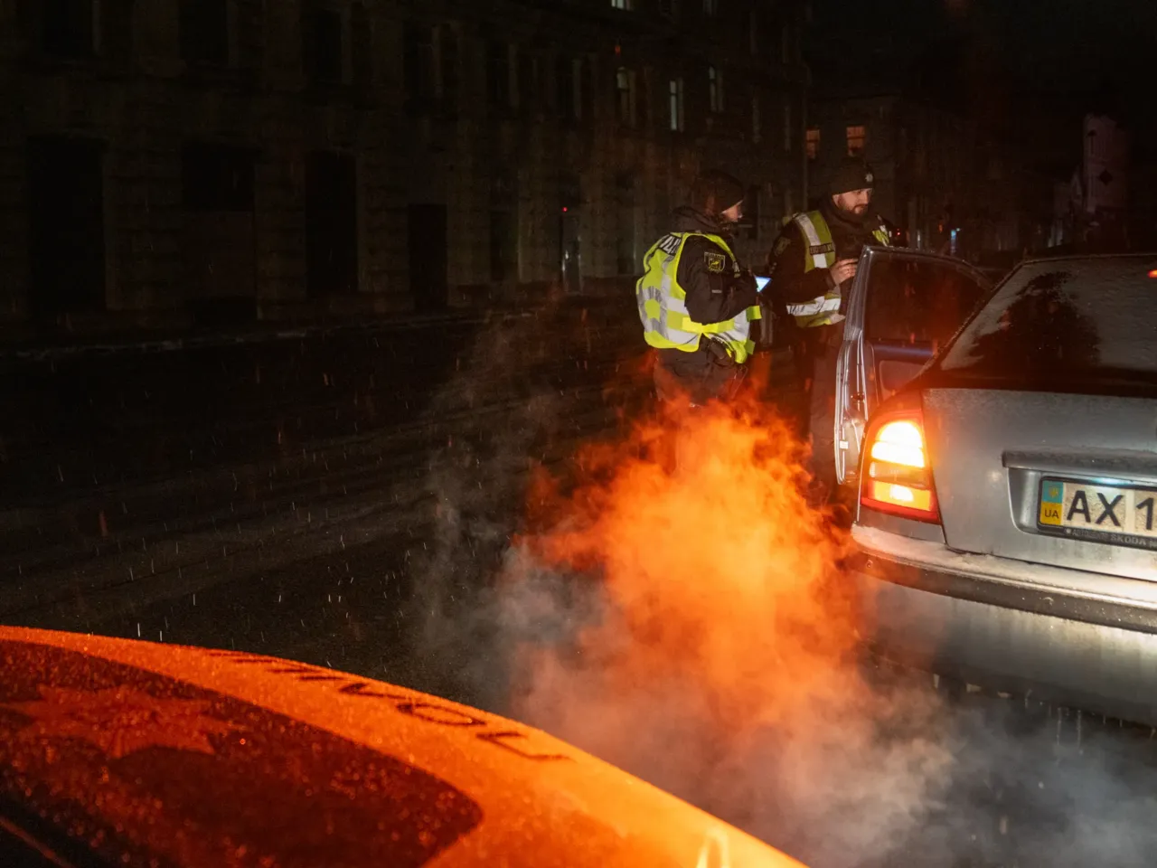 Ukrainians face fears during the country's darkest nights 5 Police stop cars in downtown Kharkiv that are on the road just after the city's 11 p.m. curfew. The only people allowed out after curfew are in a few categories like emergency responders, medical workers, military and police.