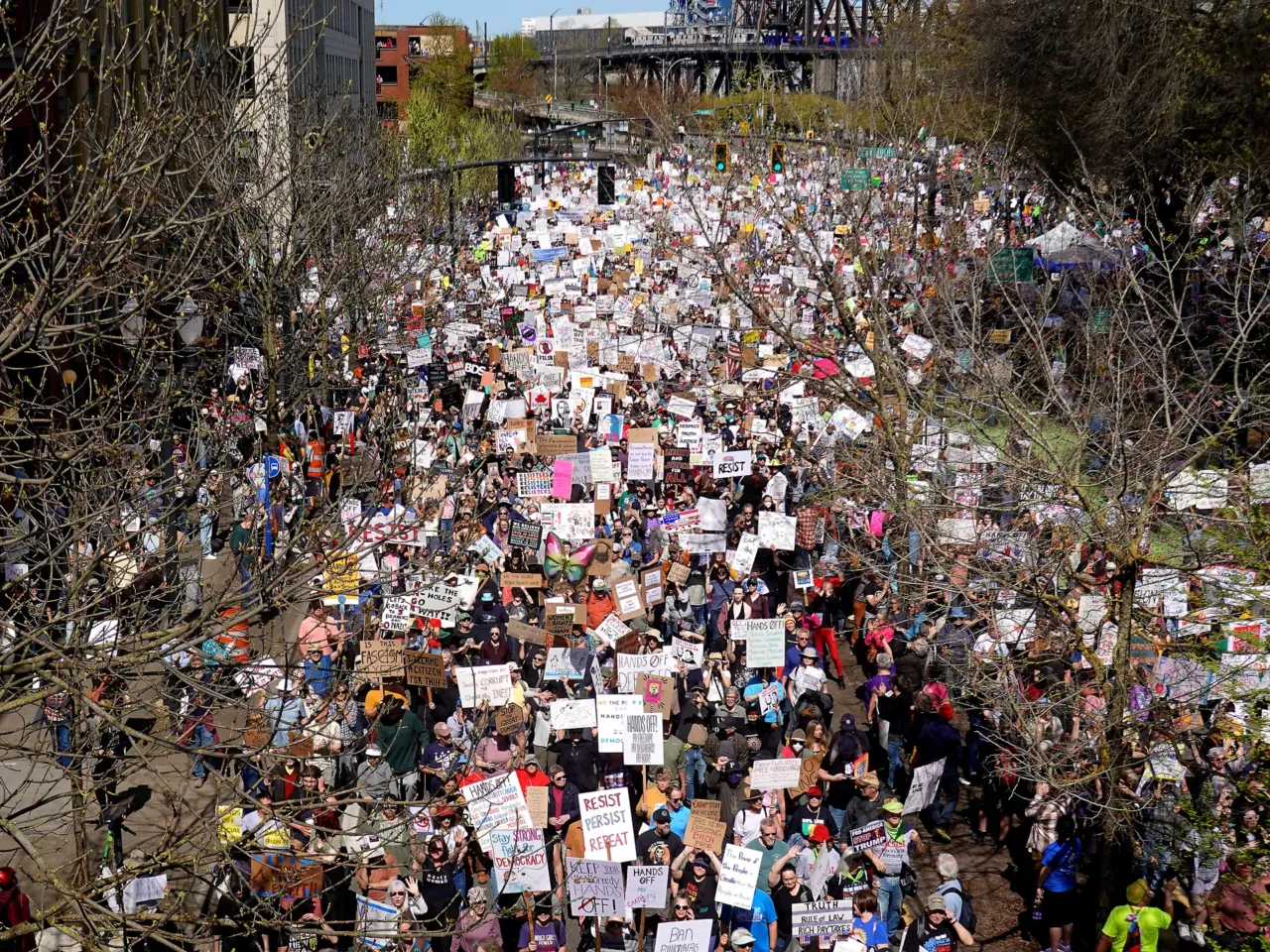 Thousands of protesters march in Portland, Ore., protesting President Trump's administration, April 5, 2025, part of "Hands Off!" protests taking place around the country.