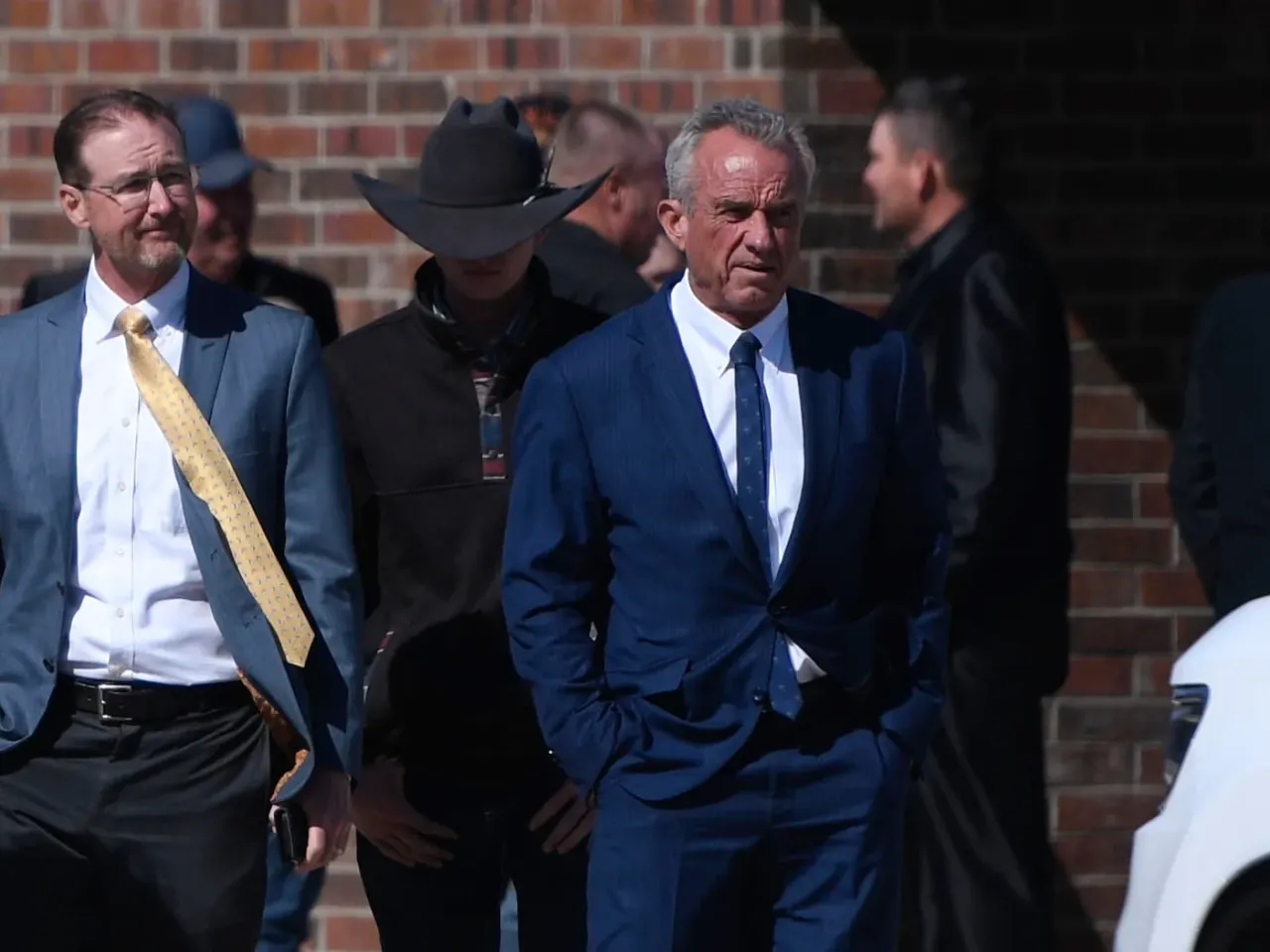 Texas' measles outbreak isn't slowing down. How can that change? 1 Health and Human Services Secretary Robert F. Kennedy Jr., right, arrives at Reinlander Mennonite Church after a second measles death of a child, on Sunday in Seminole, Texas.