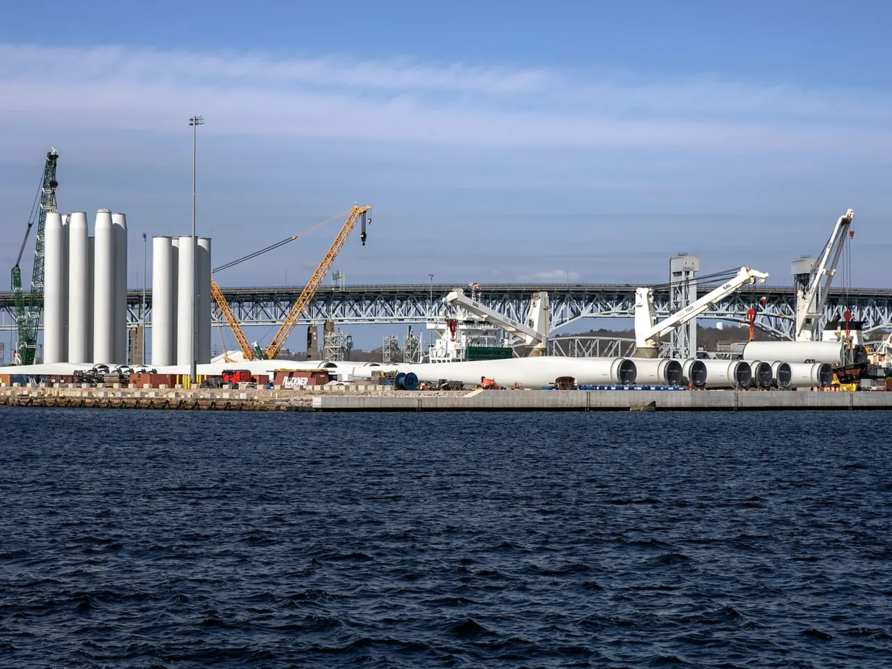 Wind turbines are partially assembled at the New London State Pier Terminal. Soon, they'll be loaded on boats and taken to the offshore wind farm site for installation.