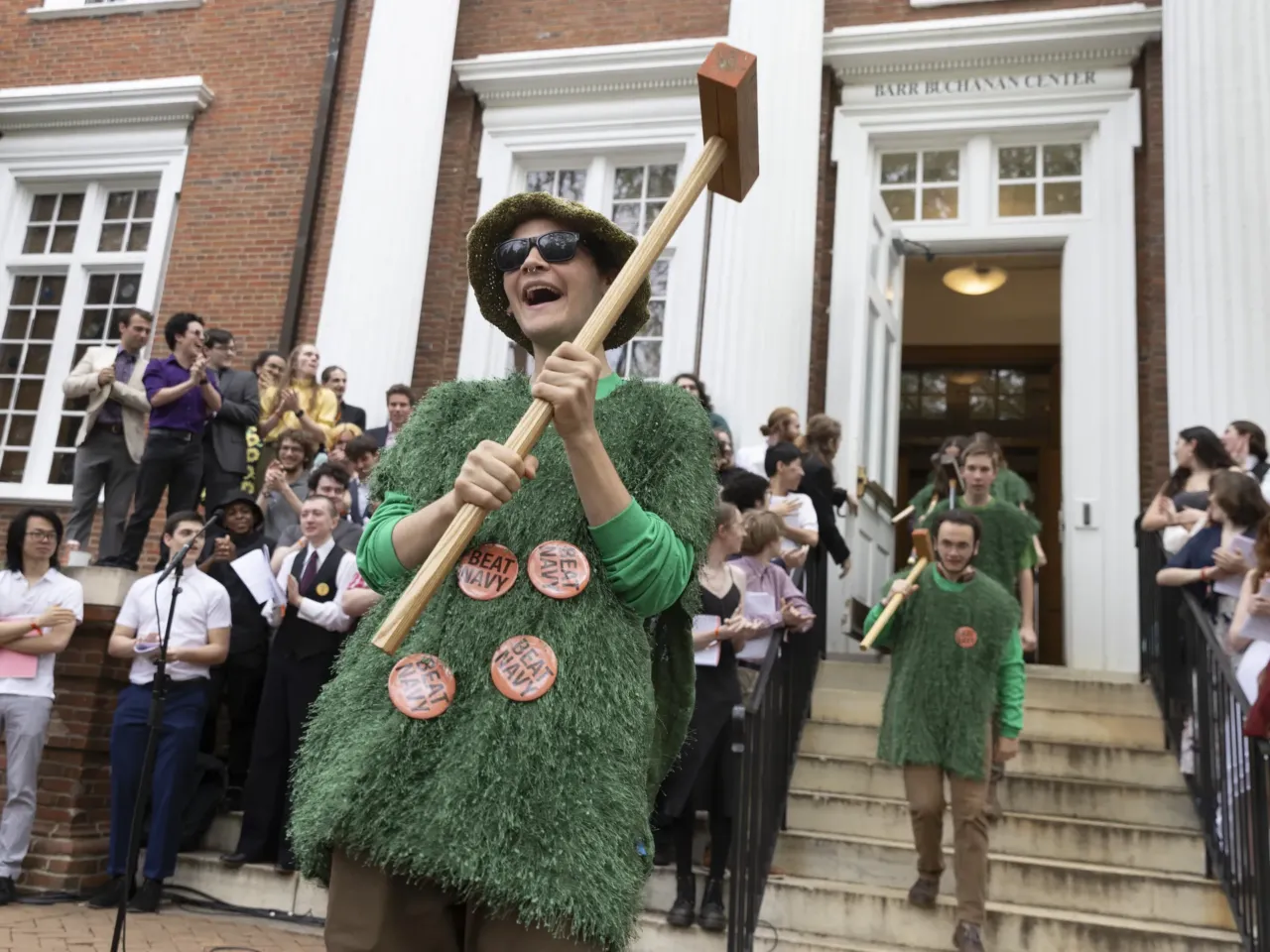 'The lawn giveth and the lawn taketh away': Photos from the 41st Annapolis Cup 1 The St. John's College croquet team makes their entrance. The Johnnies' uniforms are a well-kept secret, and this year, they were a recreation of the grass croquet court, complete with mini wickets, balls, mallets and clips.