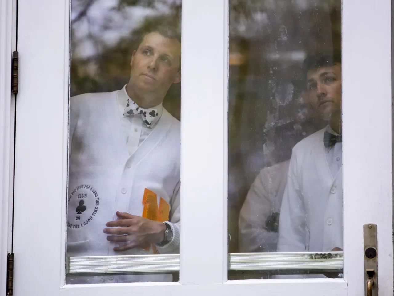 'The lawn giveth and the lawn taketh away': Photos from the 41st Annapolis Cup 11 Members of the Naval Academy team wait to make their entrance onto the field.