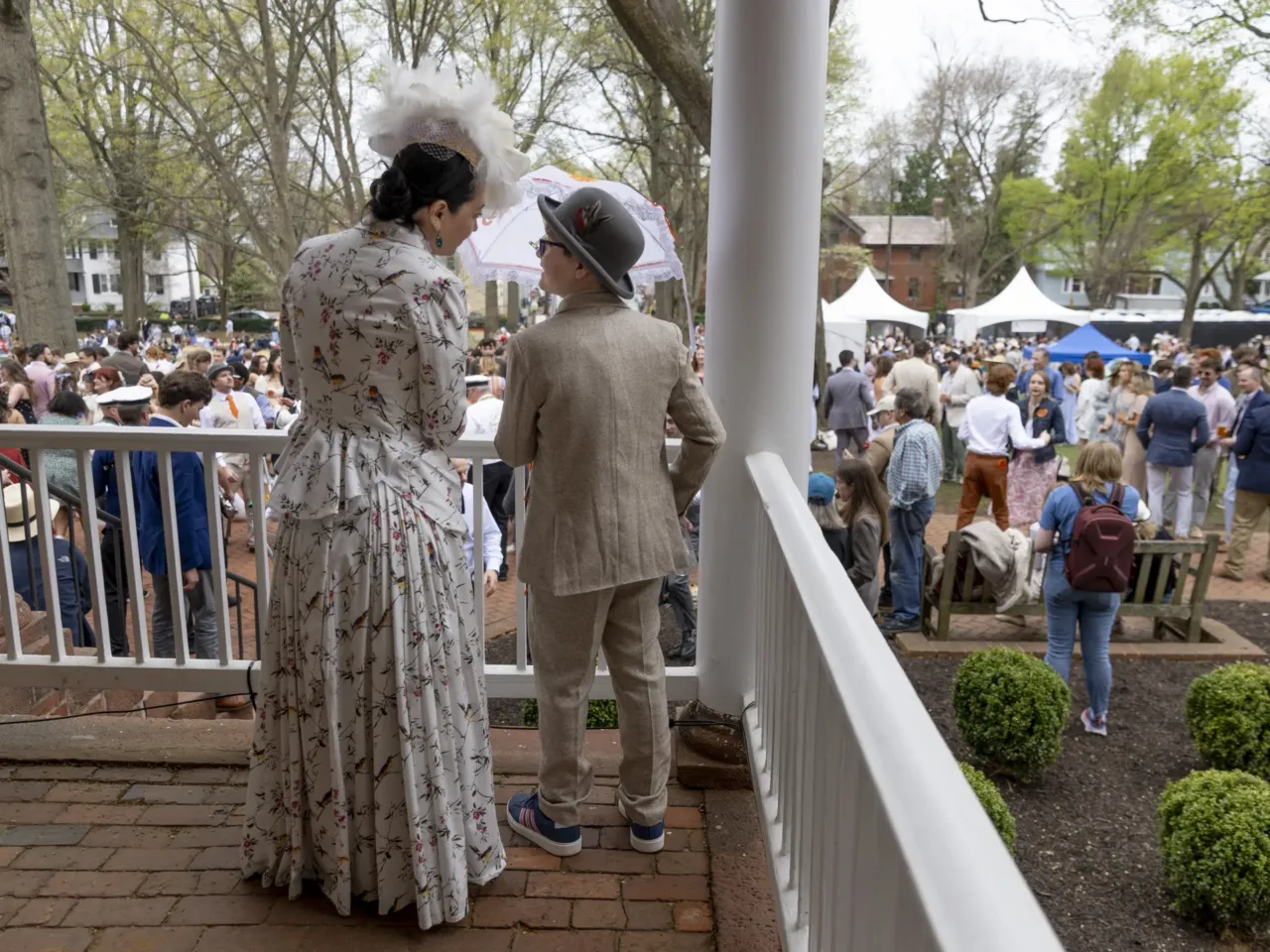 'The lawn giveth and the lawn taketh away': Photos from the 41st Annapolis Cup 16 Citlali McDowell and her son, Michael McDowell, 12, look out over the crowd gathered for the day's festivities.