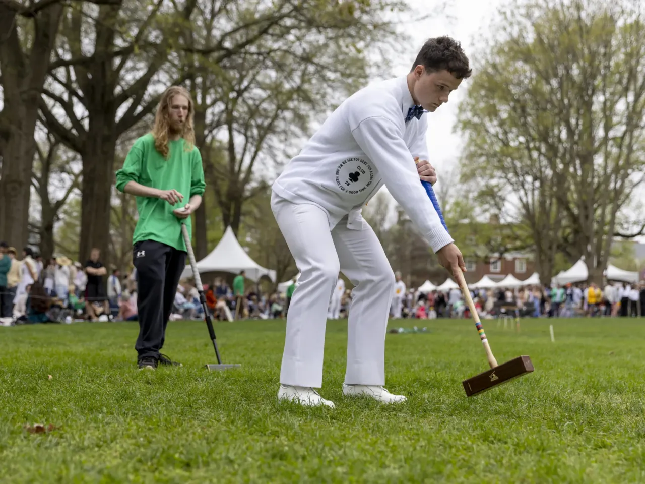 'The lawn giveth and the lawn taketh away': Photos from the 41st Annapolis Cup 19 Naval Academy's Walker French swings the mallet as St. John's Caden Marshall watches.