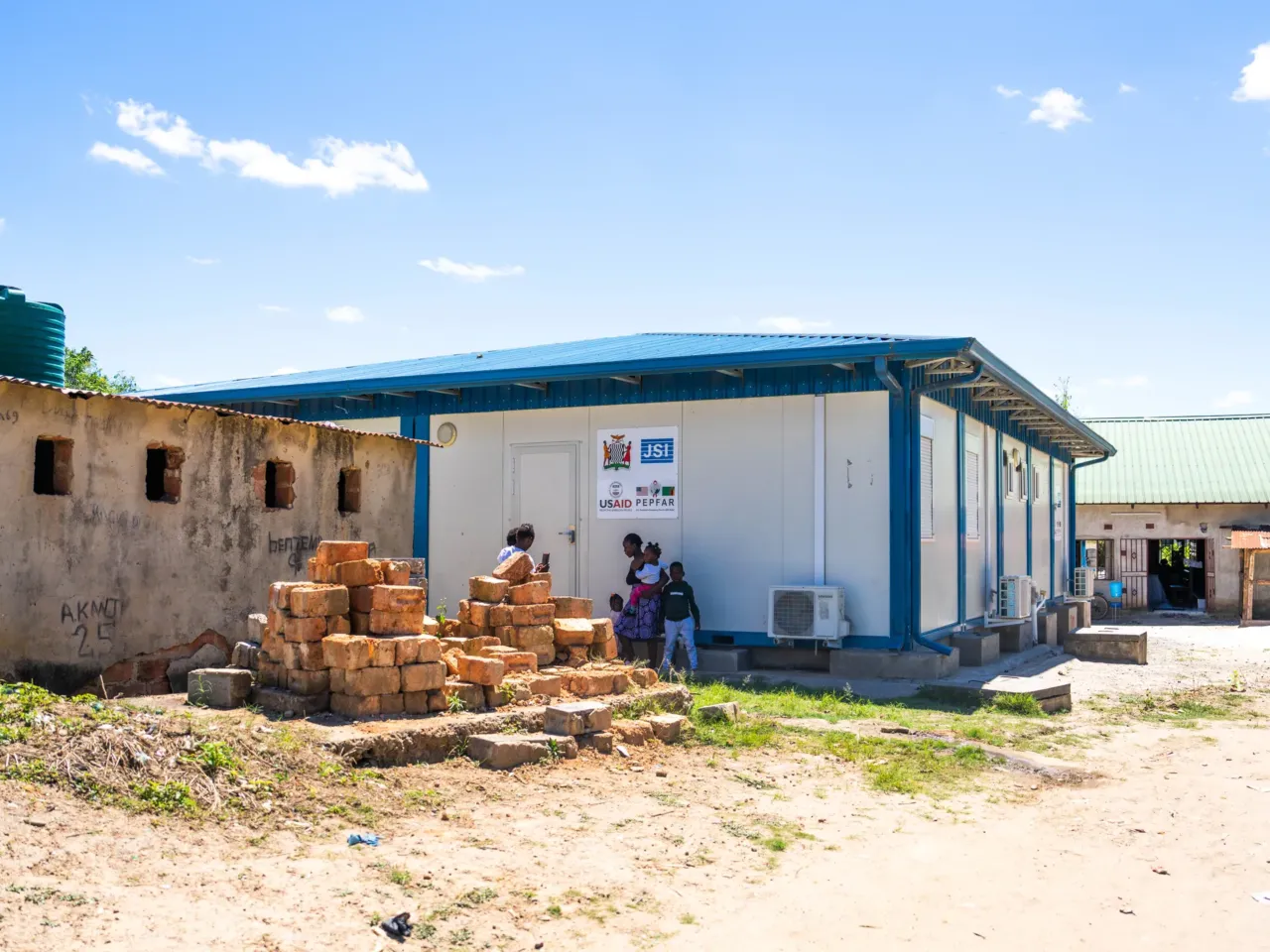 Amid U.S. funding cuts, the International AIDS Conference faces an uncertain future 1 A shuttered clinic in Kitwe, Zambia, that had been funded by the U.S. foreign aid agency USAID. The clinic provided free HIV medications and treatment to the community until it was suddenly closed in January 2025 after the Trump administration halted the vast majority of U.S. foreign assistance in light of their America First agenda.