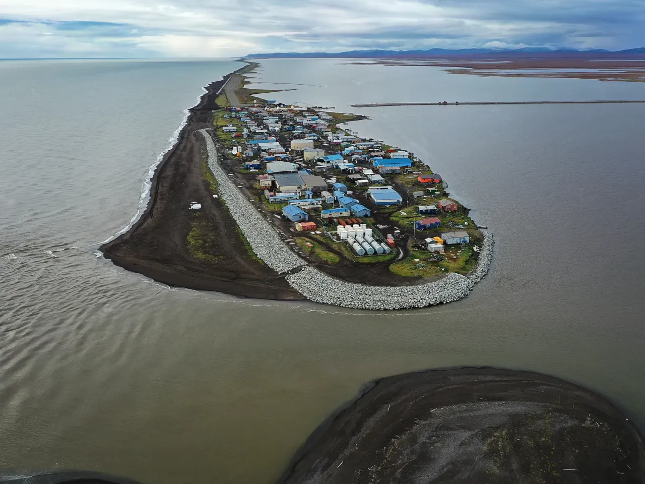 Federal funding freeze halts key infrastructure projects in tribal communities 1 Kivalina is one of the many villages home to Alaska Natives confronting coastal erosion and storm surges as the Arctic warms from climate change. The Biden administration awarded nearly $1.6 billion in Community Change Grants to help communities address the growing threats of climate change, from thawing permafrost to riverbank erosion to wildfire prevention.