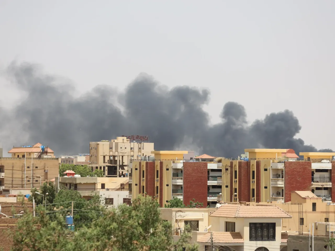 Photos: 2 years of war in Sudan 1 Smoke rises after the first strikes of the war on April 17, 2023.