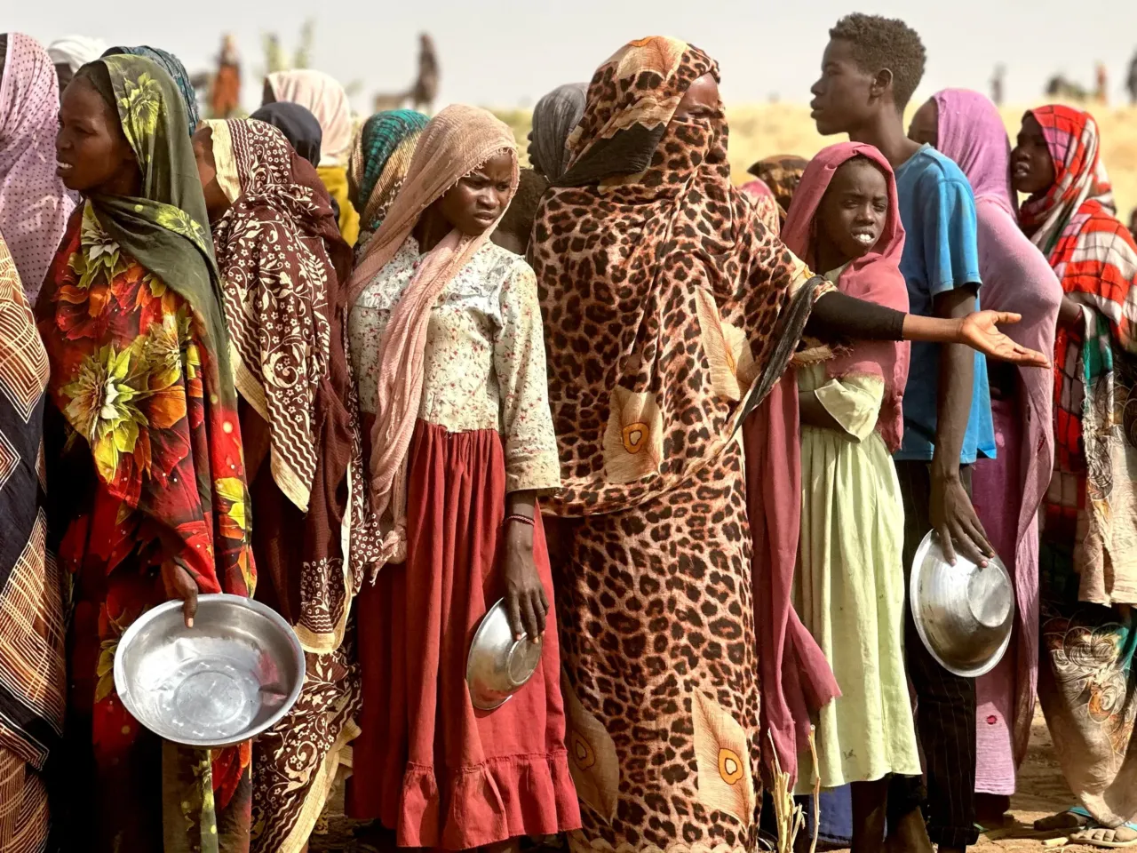 Photos: 2 years of war in Sudan 4 People who fled the Zamzam camp line up for food rations in the makeshift encampment near Tawila on April 13, 2025.