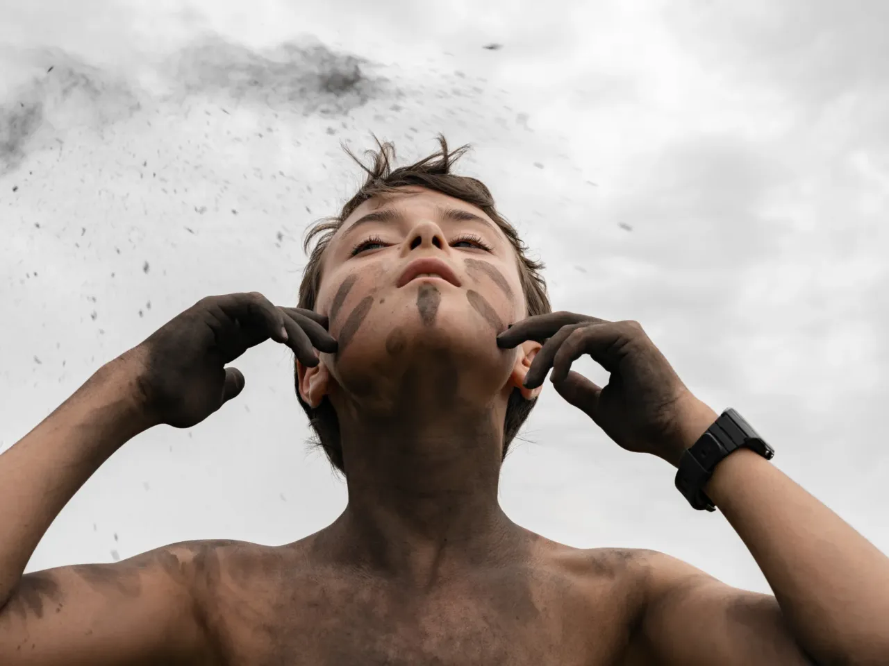 Photos: Scientists trace a butterfly migration route that is millions of years old 8 Arturo paints his face with campfire ashes at a nature immersion camp in Italy.