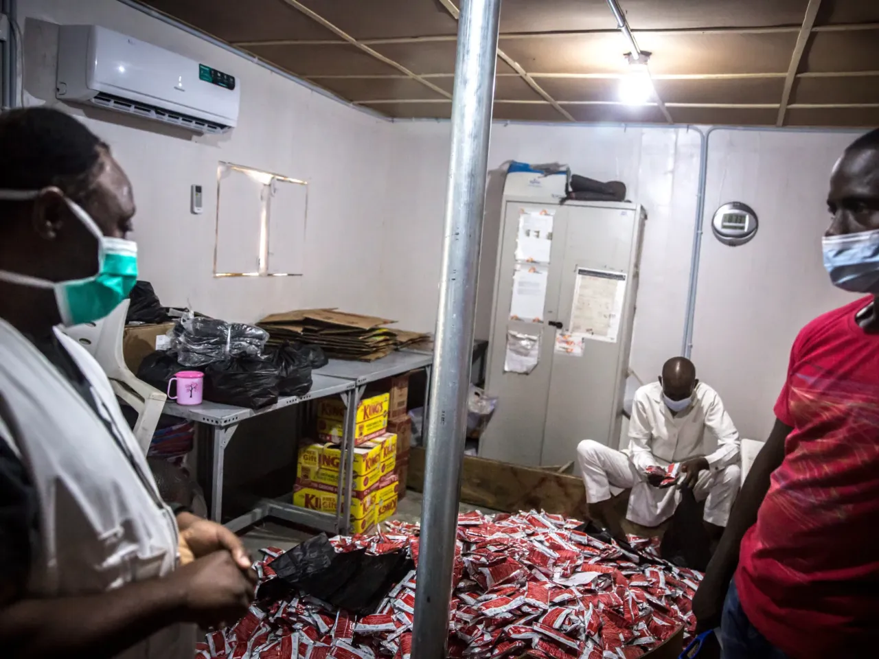Where's Plumpy'Nut? A lifesaving food for malnourished kids is caught up in U.S. cuts 3 Medics from Doctors without Borders in Nigeria stand by stacks of Plumpy'Nut, which is used to treat severely malnourished children.