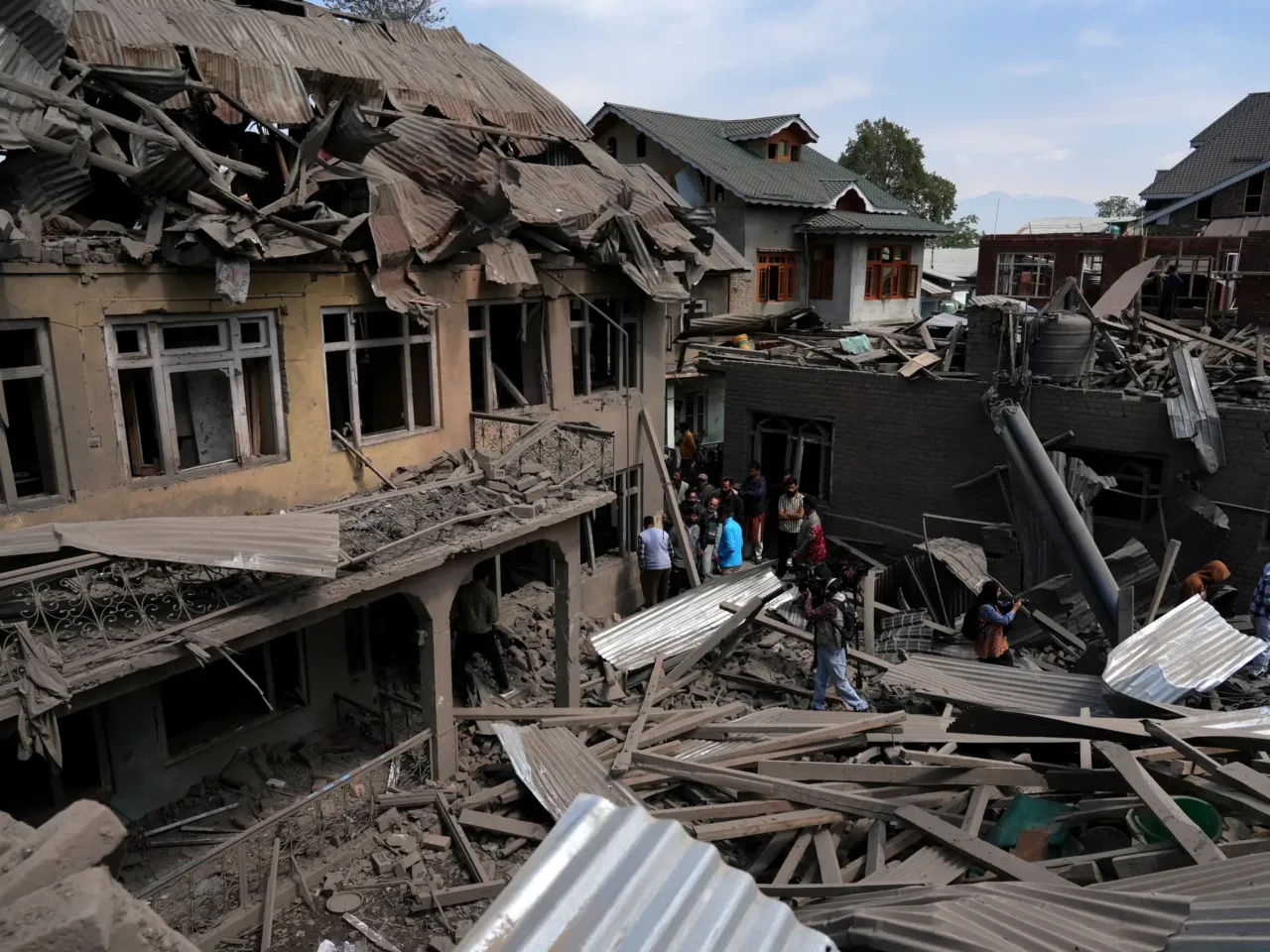 Homes destroyed and 1,500 detained in Kashmir as India cracks down following attacks 3 People stand near the razed house of alleged Kashmiri militant Ahsan Ul Haq Sheikh's family house in Murran area of Pulwama district on April 26, 2025