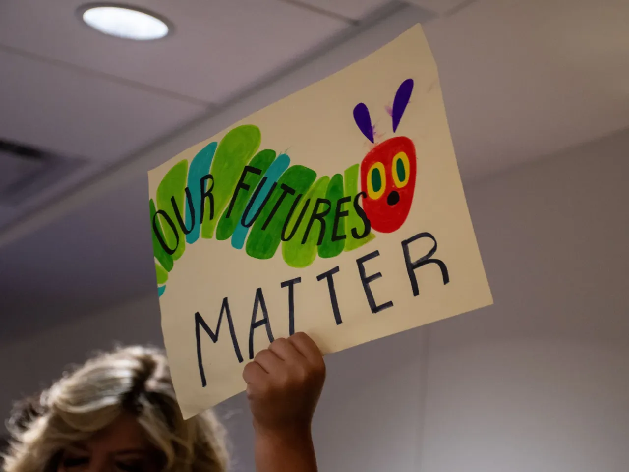 Republicans say they will still push education based on legal status 1 A protester holds up a sign to demonstrate against a bill in Tennessee that would have allowed public schools to prevent students without legal status from attending.