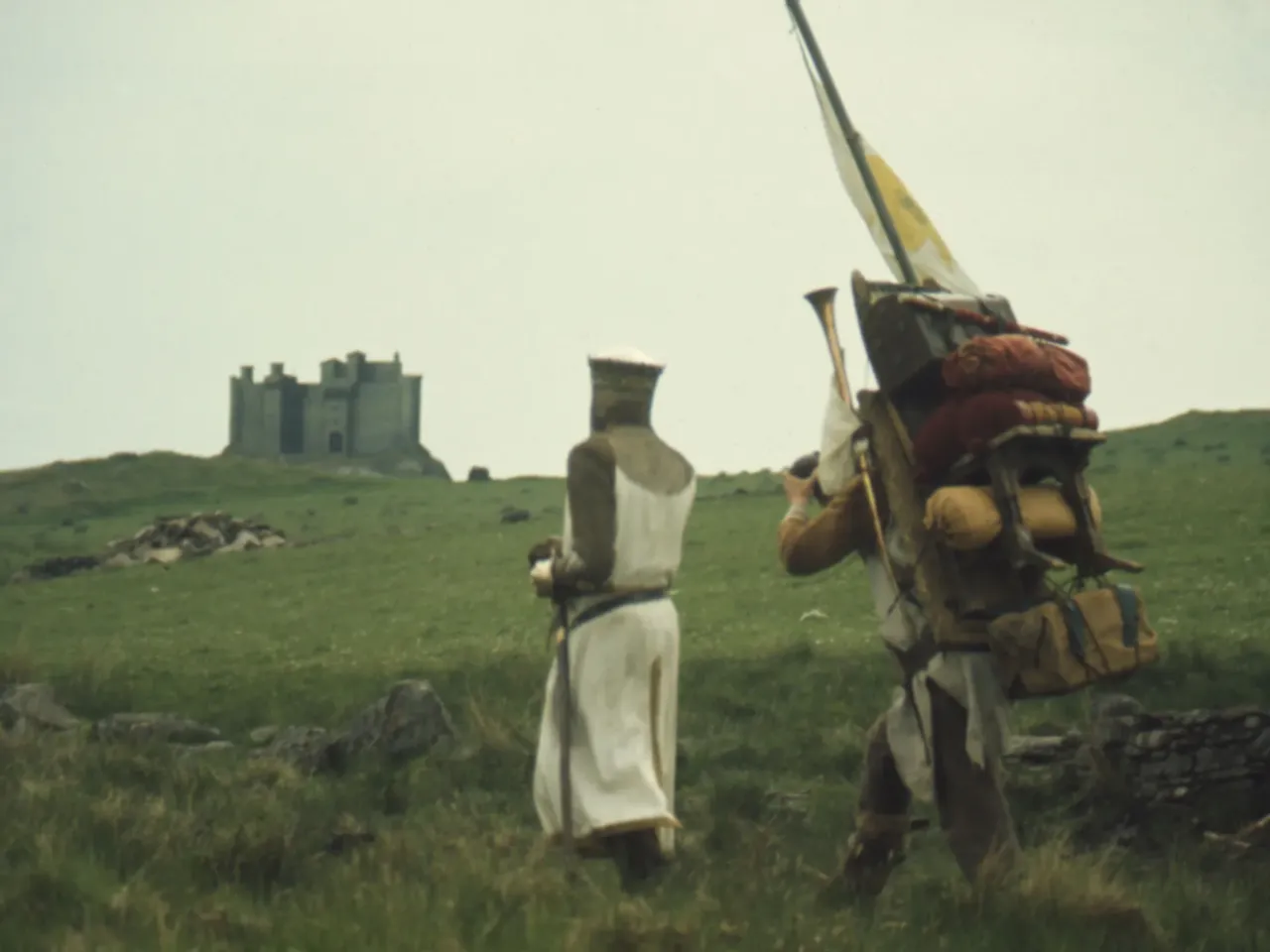 50 years of 'Monty Python and the Holy Grail': Its legacy and what it means to fans 3 Patsy (Terry Gilliam) clanking coconuts together while following a galloping King Arthur (Graham Chapman).