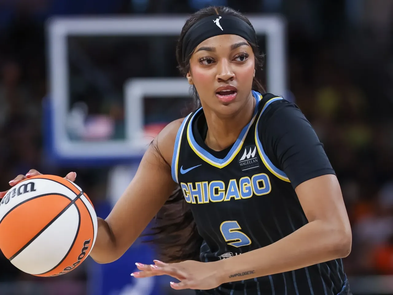 Angel Reese of the Chicago Sky brings the ball up the court during the Sky's game against the Indiana Fever at Wintrust Arena on August 30, 2024, in Chicago, Illinois.
