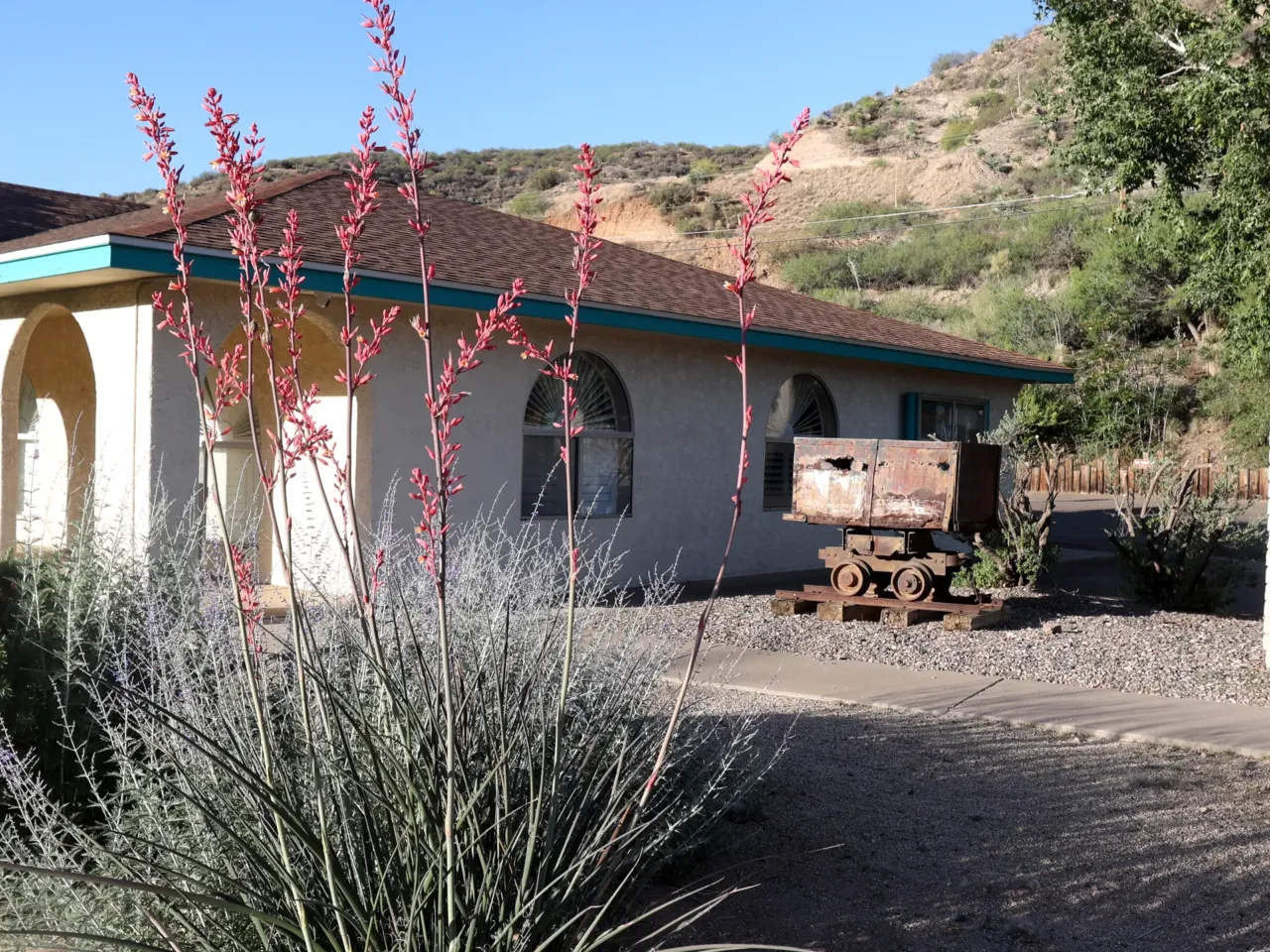 An old mine cart is parked outside the Gila County Historical Museum in Globe, Arizona. Mining is still part of the local economy, but many area residents have low-wage jobs that make them eligible for Medicaid.