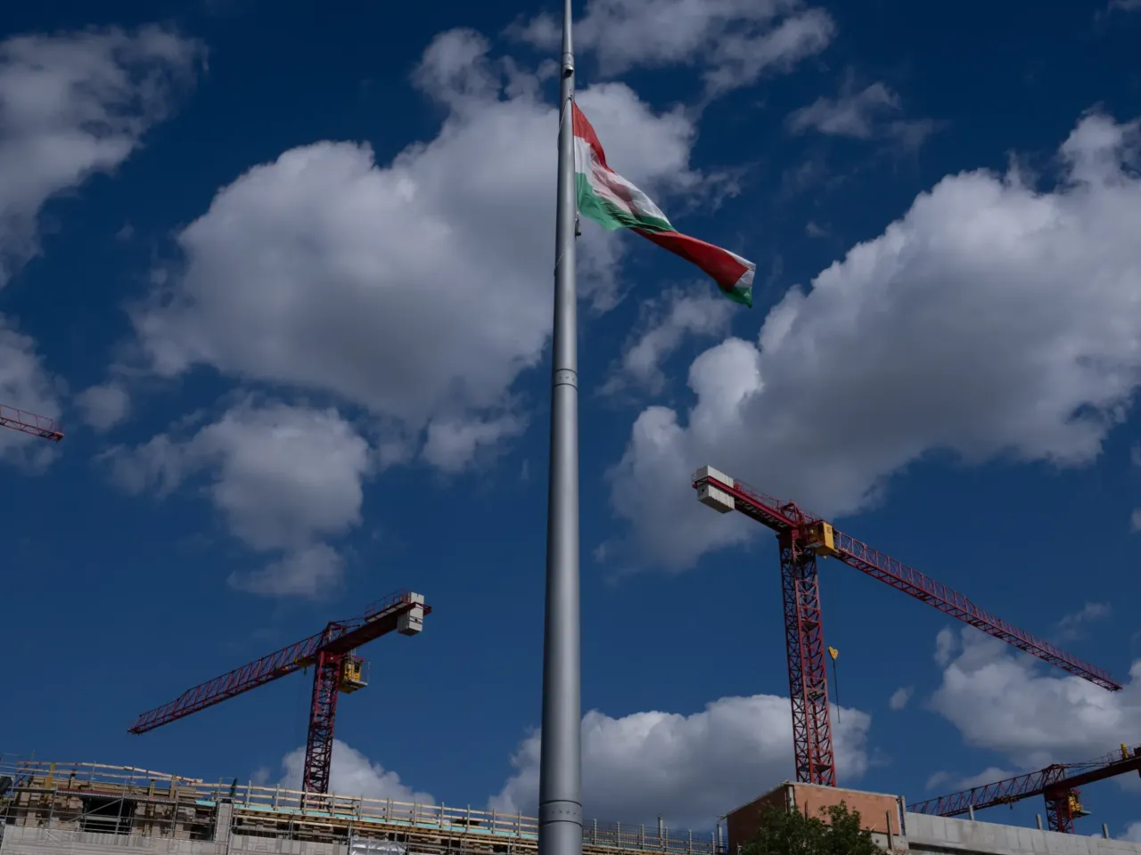 Hungary inspires U.S. conservatives. Its leader is seen as running a 'dictatorship' 5 Construction cranes can be seen in Budapest's castle district, along with the Hungarian flag.
