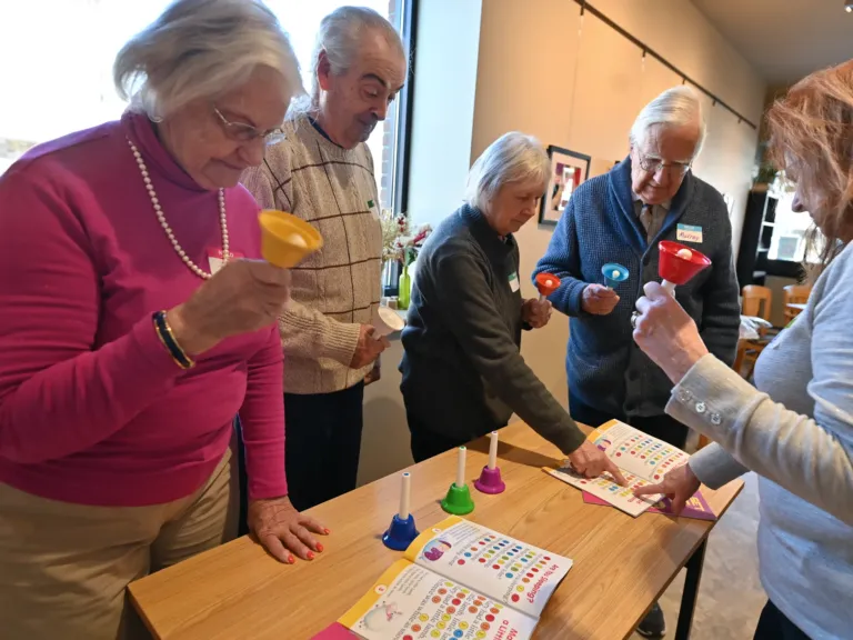 Memory cafes offer camaraderie and fun for people with dementia — and their caregivers