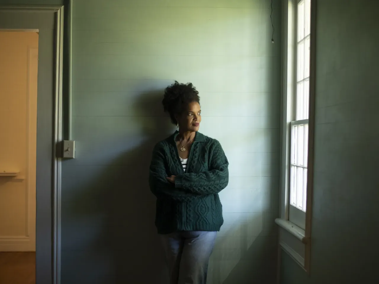 Over-polluted communities vow to fight despite EPA's rollback on environmental justice 4 Jo Banner looks outside the window of the Descendants Project headquarters in Wallace, Louisiana. Banner is the co-founder of the nonprofit, which seeks to preserve the contributions of the enslaved Africans who once worked the plantations in the area. Banner says the legacy of the plantation system continues through the prevalence of petrochemical pollution that harms the descendants of the enslaved.