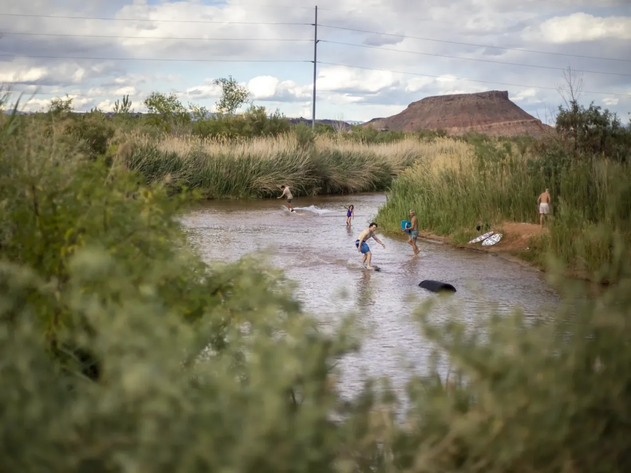This city is exploring an unconventional solution to water scarcity: sewage 6 The Virgin River is where the St. George area gets its water for drinking and irrigation. It's also a hub for outdoor recreation. Here, people cool off at the Virgin River Skimboard Park.