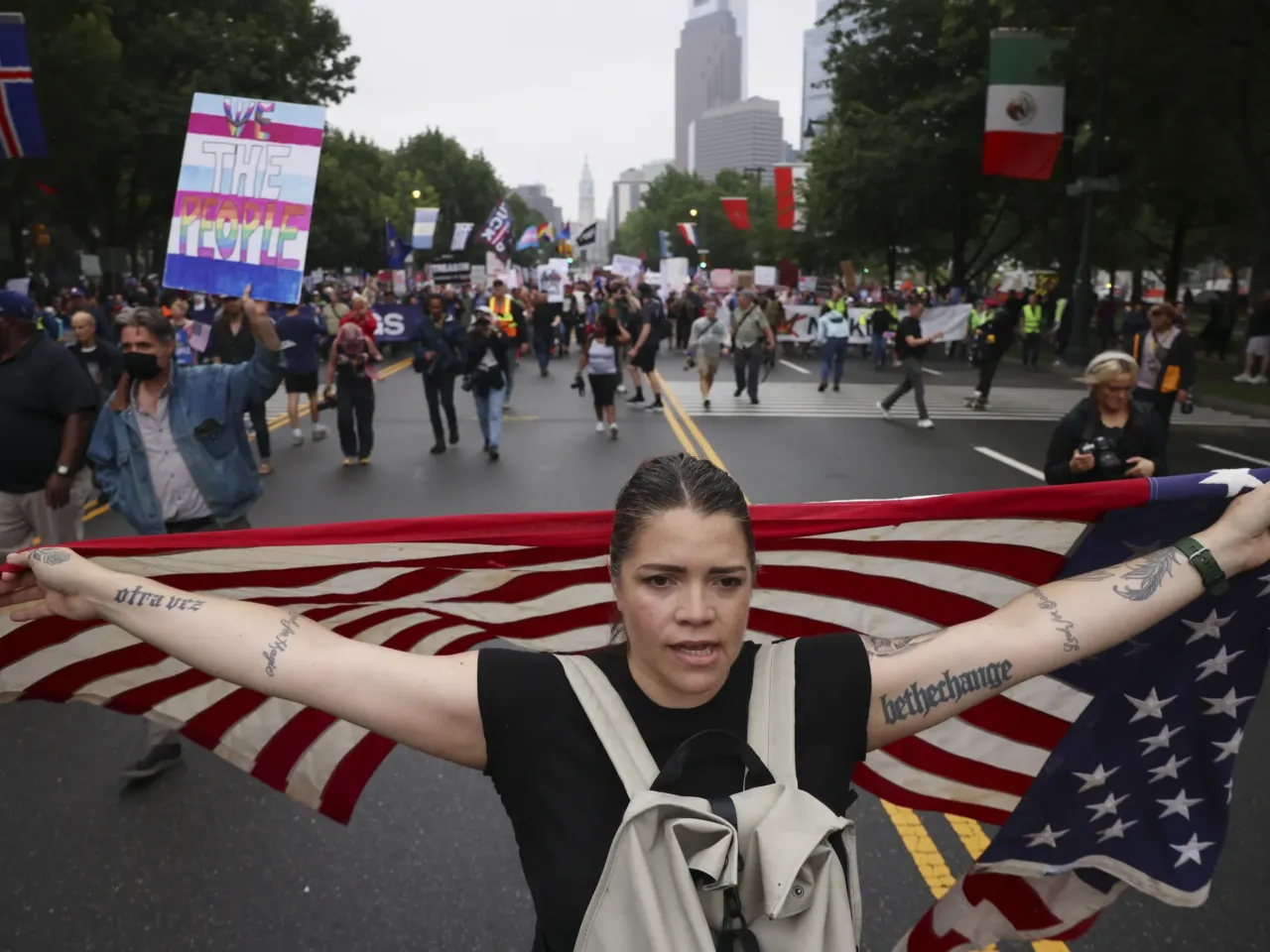 Demonstrators march down Benjamin Franklin Parkway during the No Kings protest, Saturday, June 14, 2025, in Philadelphia.