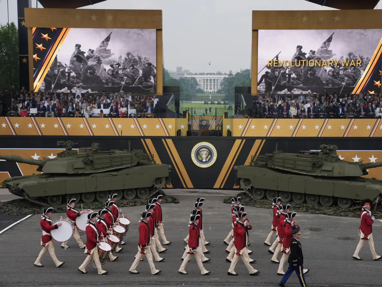3 takeaways from the military parade and No Kings protests on Trump's birthday 2 Members of the U.S Army parade down Constitution Avenue, representing the Revolutionary War era.