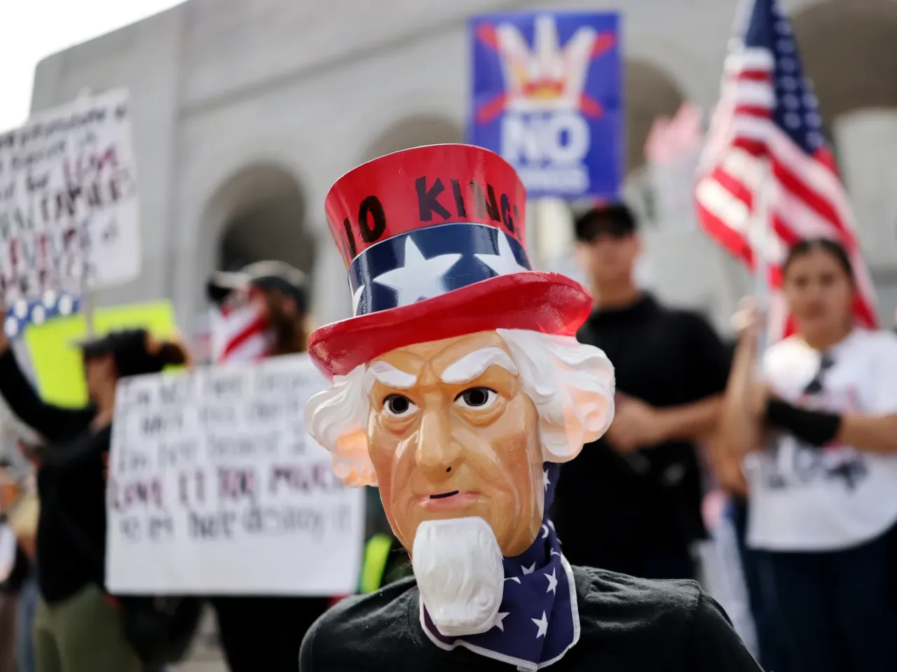3 takeaways from the military parade and No Kings protests on Trump's birthday 6 Protesters rally in front of City Hall in Los Angeles on Saturday.