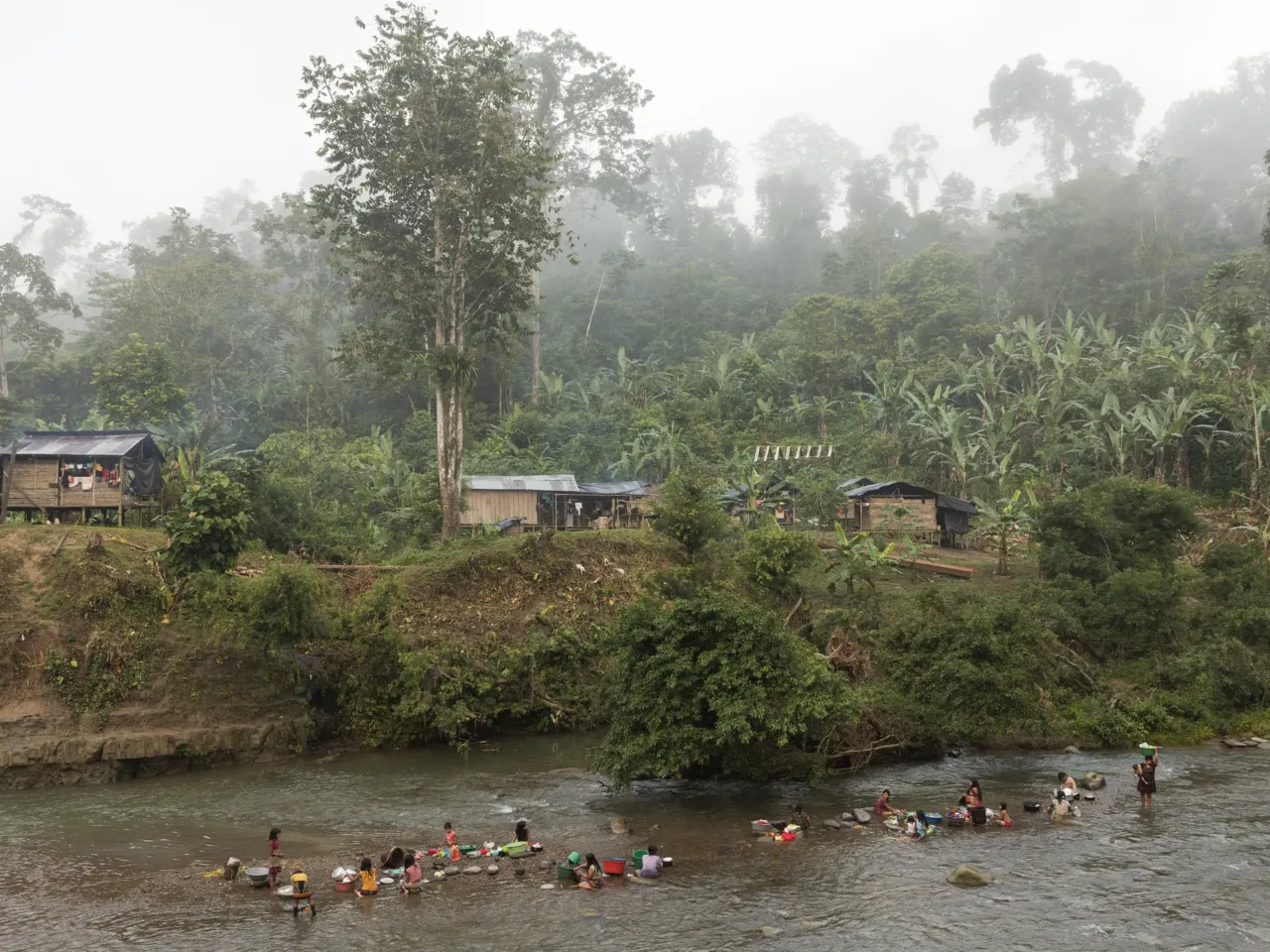 Photos: How torn pictures and trusted herbs create healing in Colombia 3 The Baudò River is a gathering spot for this community.