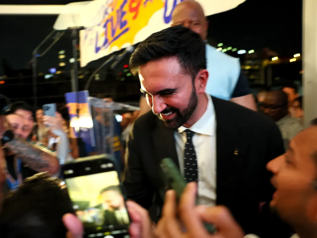 New York City mayoral candidate Zohran Mamdani greets supporters during a primary election night gathering in New York on June 24, 2025.