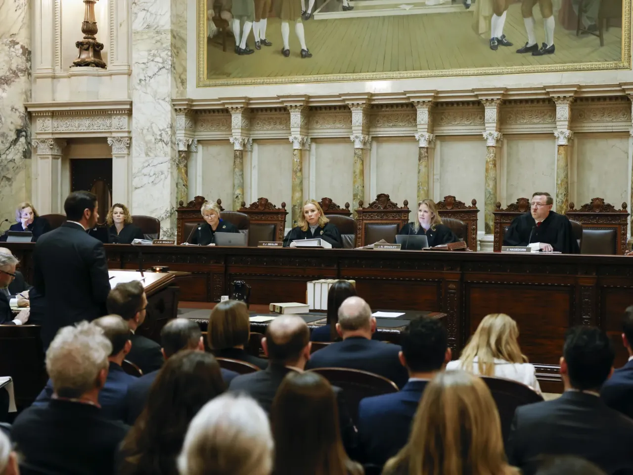 The Wisconsin Supreme Court listens to arguments during a redistricting hearing at the state Capitol, Nov. 21, 2023, in Madison, Wis. The court decided Wednesday, July 2, 2025, that the state's 176-year-old law does not ban abortion.