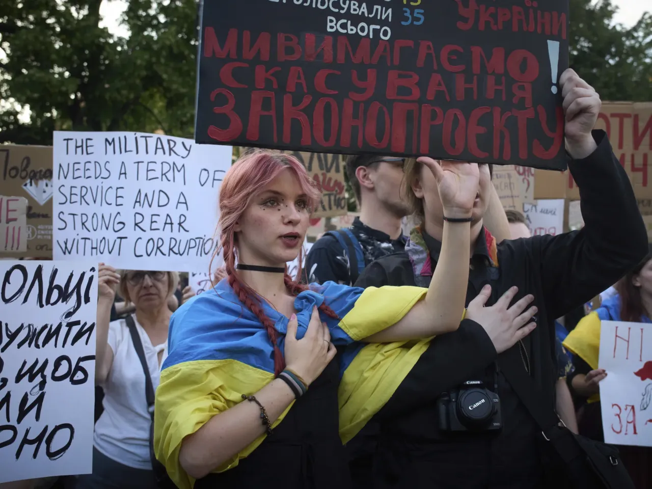Demonstrators protest against the bill proposed by President Volodymyr Zelenskyy in Kyiv, Ukraine, Thursday, July 24, 2025.