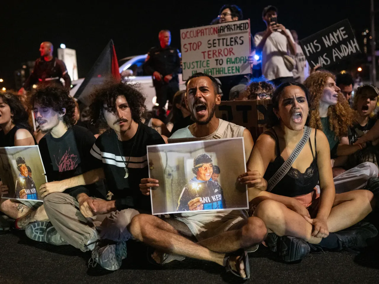 A Palestinian activist was killed by the violence he sought to stop 1 Demonstrators block traffic during a protest over the death of Palestinian activist Awdah Al Hathaleen on Aug. 3 in Tel Aviv, Israel.