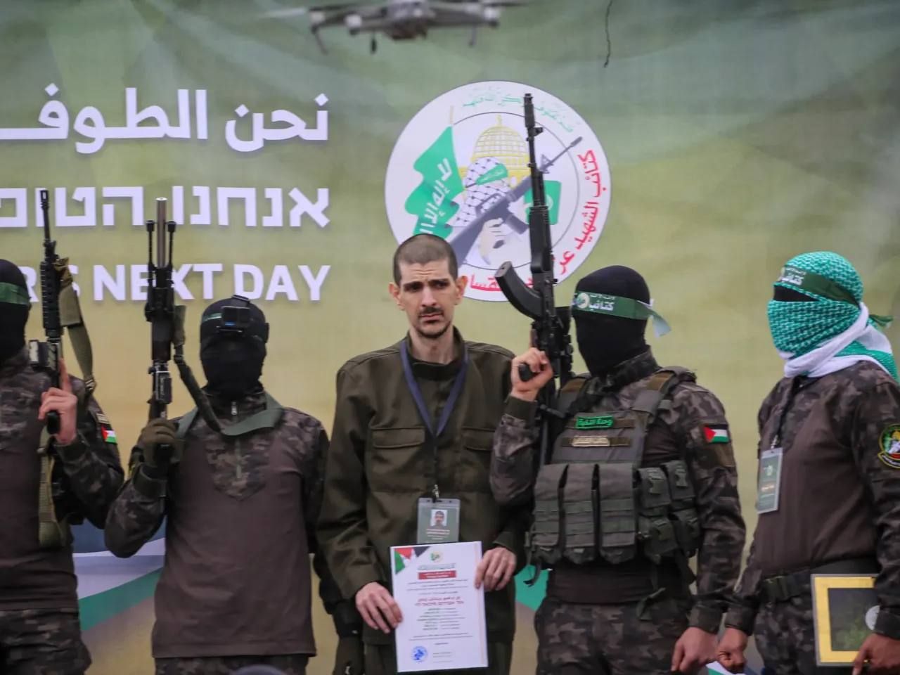Hamas has one top strategy: End the war and survive 2 Palestinian Hamas fighters escort Israeli hostage Or Levy on a stage before handing him over to a Red Cross team in Deir el-Balah, central Gaza, on Feb. 8, as part of a hostage-prisoner exchange and ceasefire deal with Israel.