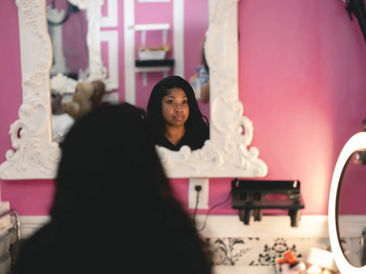 In New Orleans, memories of Katrina remain vivid 20 years later 8 Brittany Penn, owner of Lace Exclusive Salon on Desire Street, poses in her salon in the Upper 9th ward in New Orleans, La., on Aug. 26, 2025.