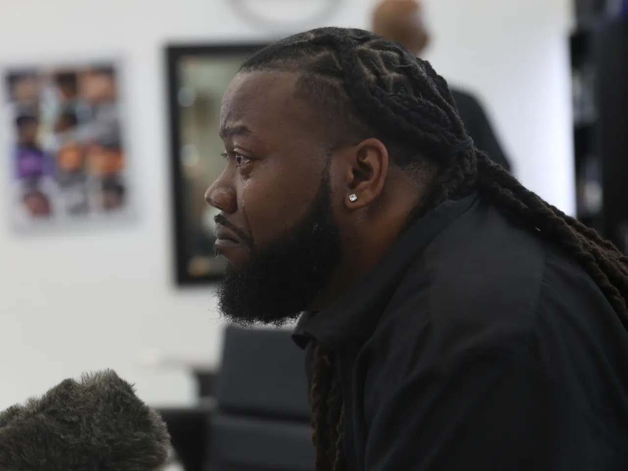 After Hurricane Katrina, evacuees changed Houston and the city changed them 2 John "Speedy" Riddle sheds tears while being interviewed about Hurricane Katrina at A Shaving Grace barbershop in the southeast Houston area in July 2025.