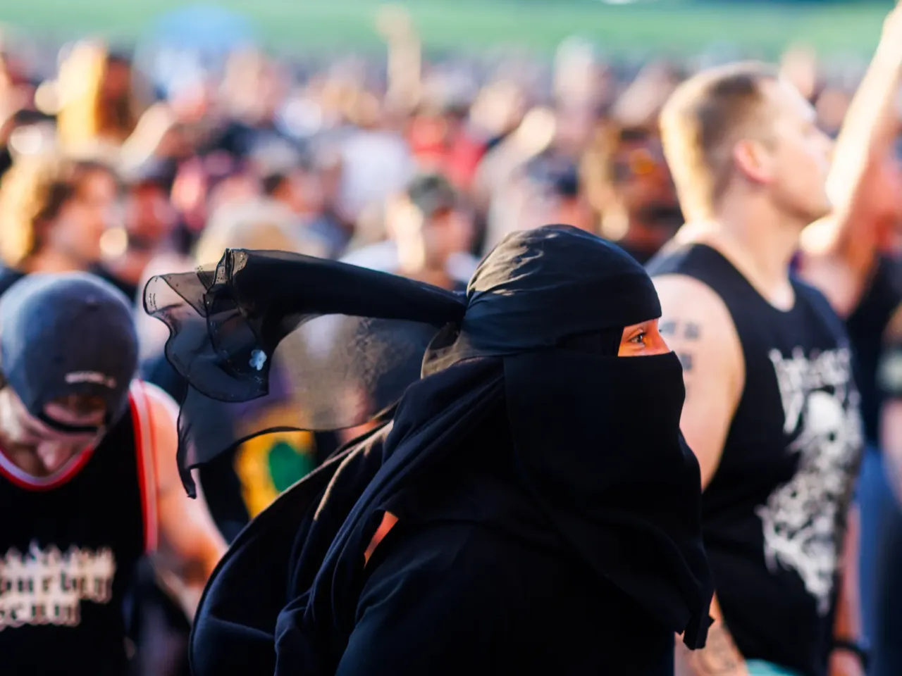 Danielle Alamrani of Brooklyn dances in a mosh pit as Hatebreed opens the show.