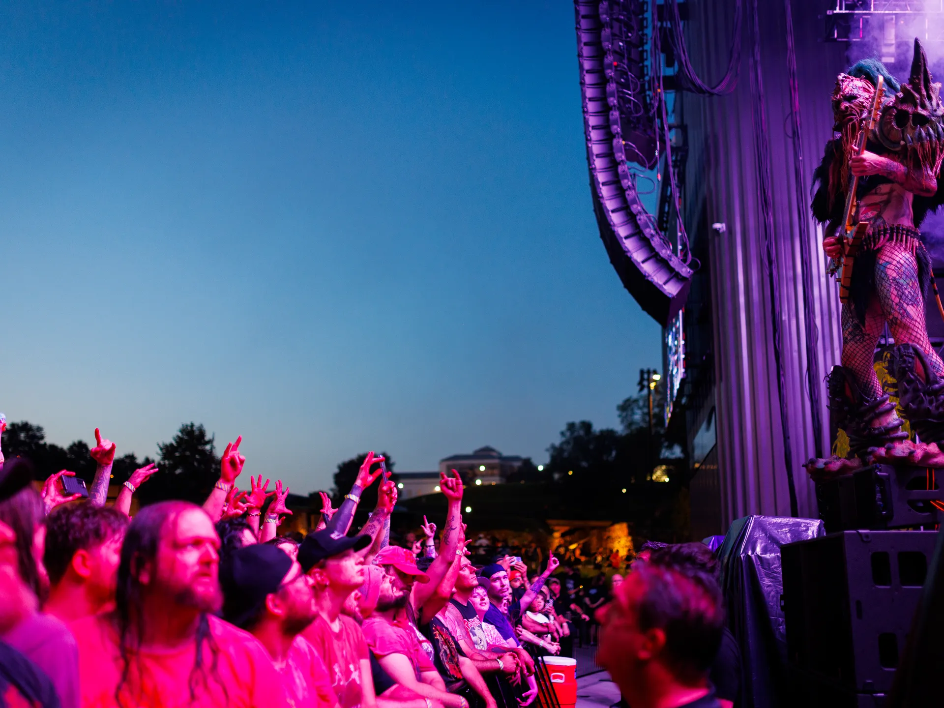Joy and happiness radiate when GWAR and Lamb of God return to Richmond 44 Grodius Maximus is seen performing on the guitar during GWAR's set at Allianz Amphitheater in Richmond on July 24, 2025. The crowd is seen cheering him on.