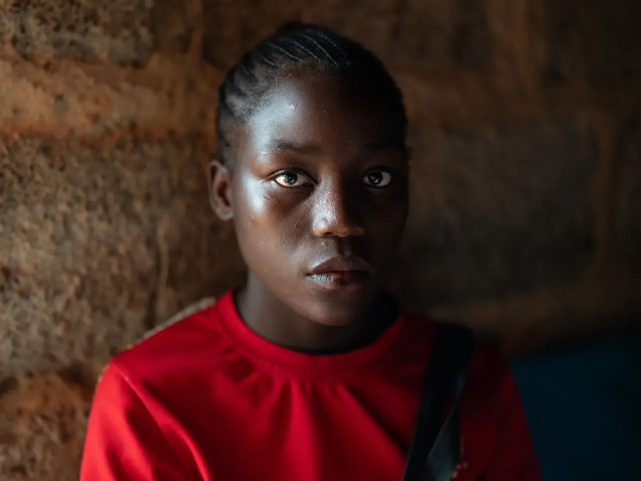 On April 3, Ben de la Cruz of NPR photographed Catherine Mwaloe of Zambia for a story on the impact of U.S. aid cuts. The 16-year-old, who contracted HIV from her mother at birth, said she had only one month's supply of the medicine that keeps the virus at bay — a result of a shutdown of the clinic, funded by U.S. aid, that had provided free medication. After NPR's story published, the Zambian government investigated and set up a new system that enables Mwaloe and others to obtain the drugs they need. But the teenager still worries about getting enough food, previously provided through a U.S. program.