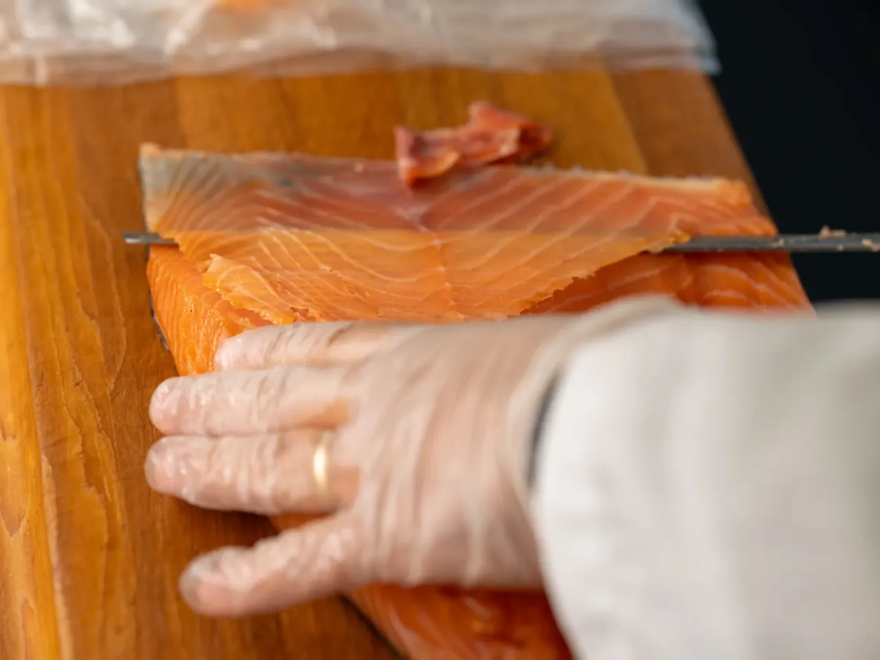 Russ & Daughters in NYC celebrates '100 years of appetizing' and family 4 Slicers — a real job title — practice their art at Russ & Daughters