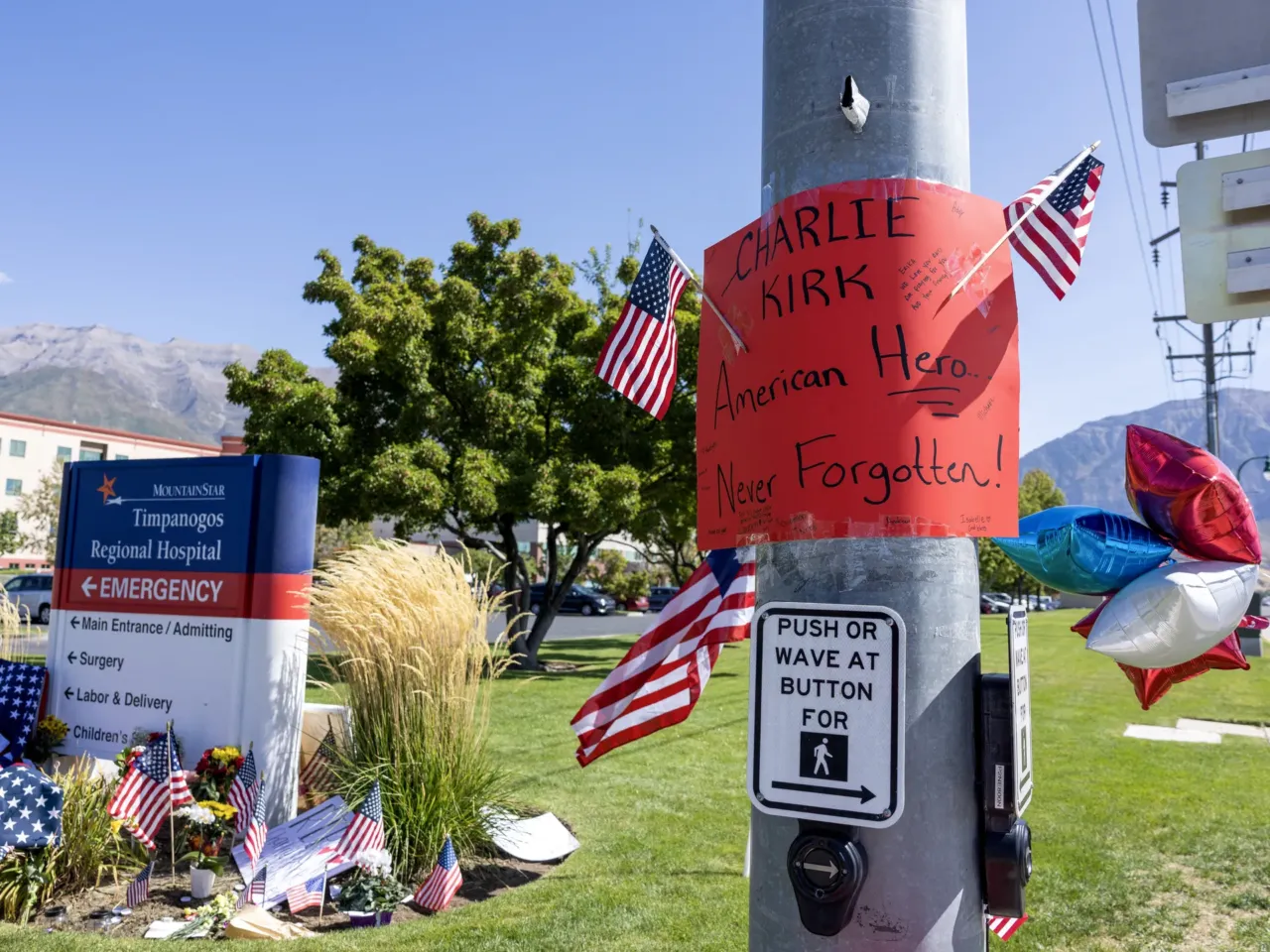 People are losing jobs due to social media posts about Charlie Kirk 1 Flags and a sign honor Charlie Kirk at a memorial set up outside of Timpanogos Regional Hospital in Orem, Utah, on September 11, 2025.