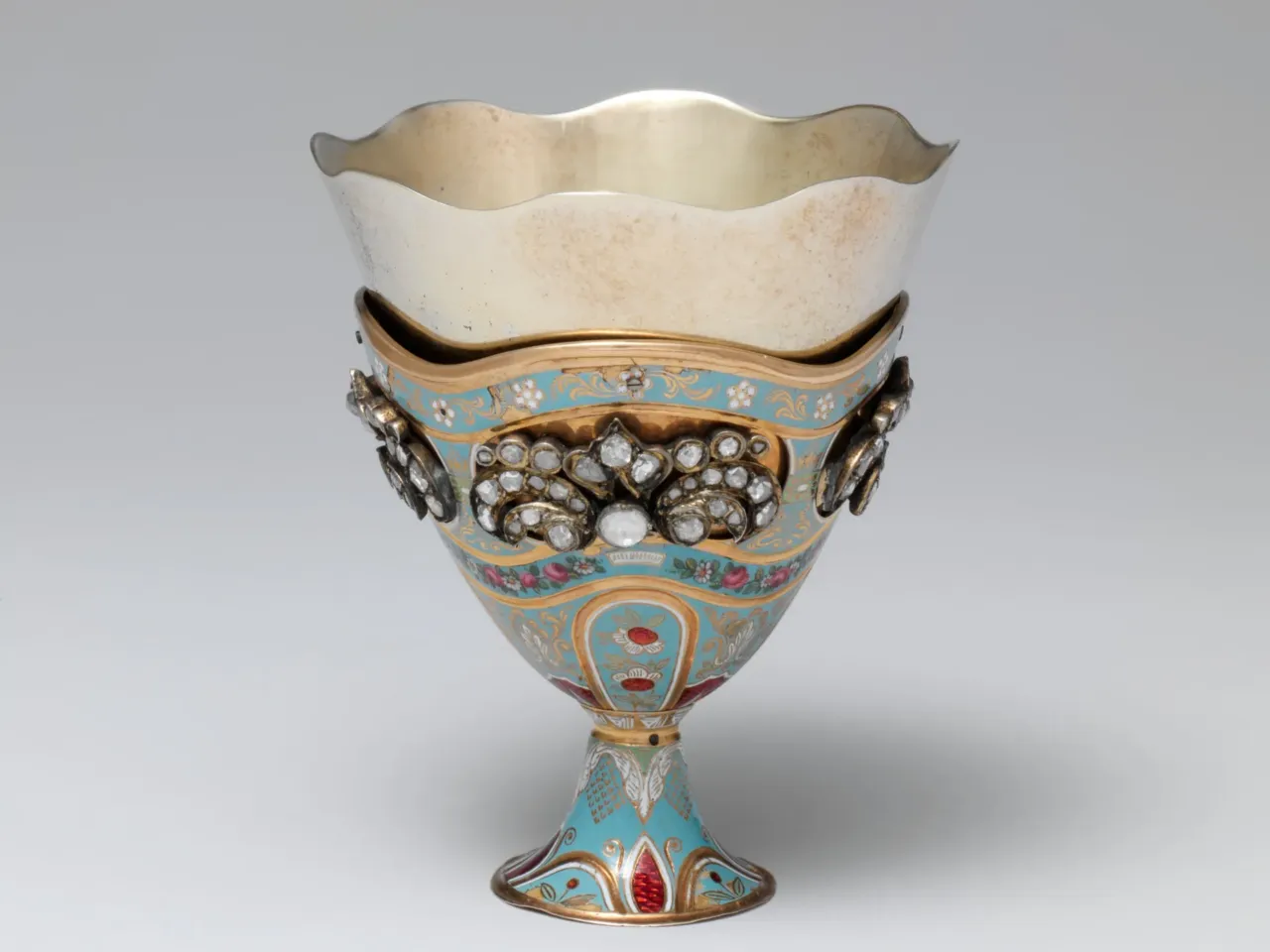 What to know about zarfs, the fanciest way to drink coffee 3 A Swiss colorful enamel music box in the form of a zarf, circa 1840, decorated with rose diamond foliate sprays, with later silver gilt liner.