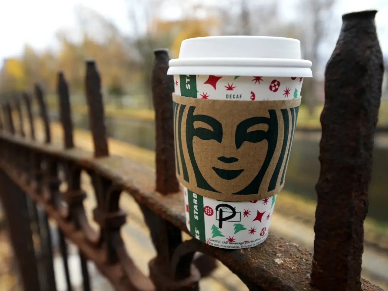 What to know about zarfs, the fanciest way to drink coffee 4 A Starbucks coffee cup is pictured with a cardboard sleeve. Some people consider the sleeves to be zarfs, but others disagree.