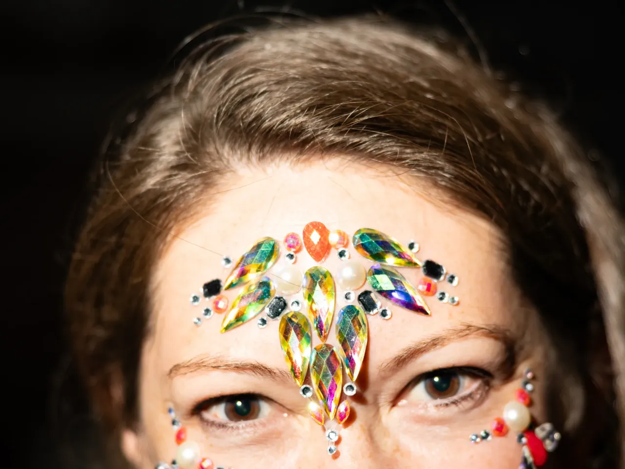A few attendees came adorned with jewels on their faces.