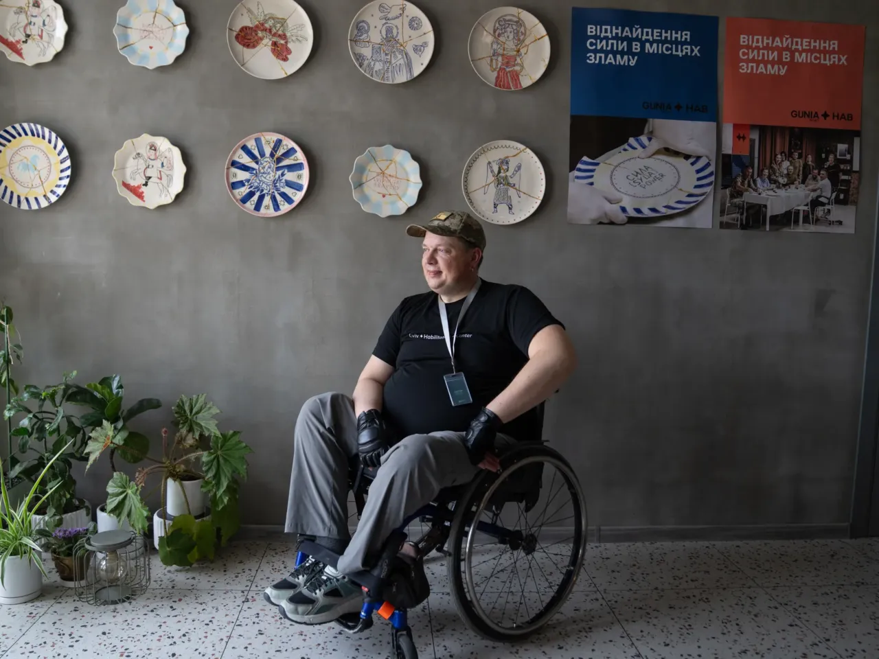 How to reintegrate over a million veterans? Groups in Ukraine are working on it 5 Serhiy Titarenko at the Lviv Habilitation Center where he works to help other veterans grow accustomed to a life outside of the military. On the wall are plates that have been shattered and then glued back together in a Japanese method, a symbol he uses for showing how veterans can become whole again while acknowledging their trauma.