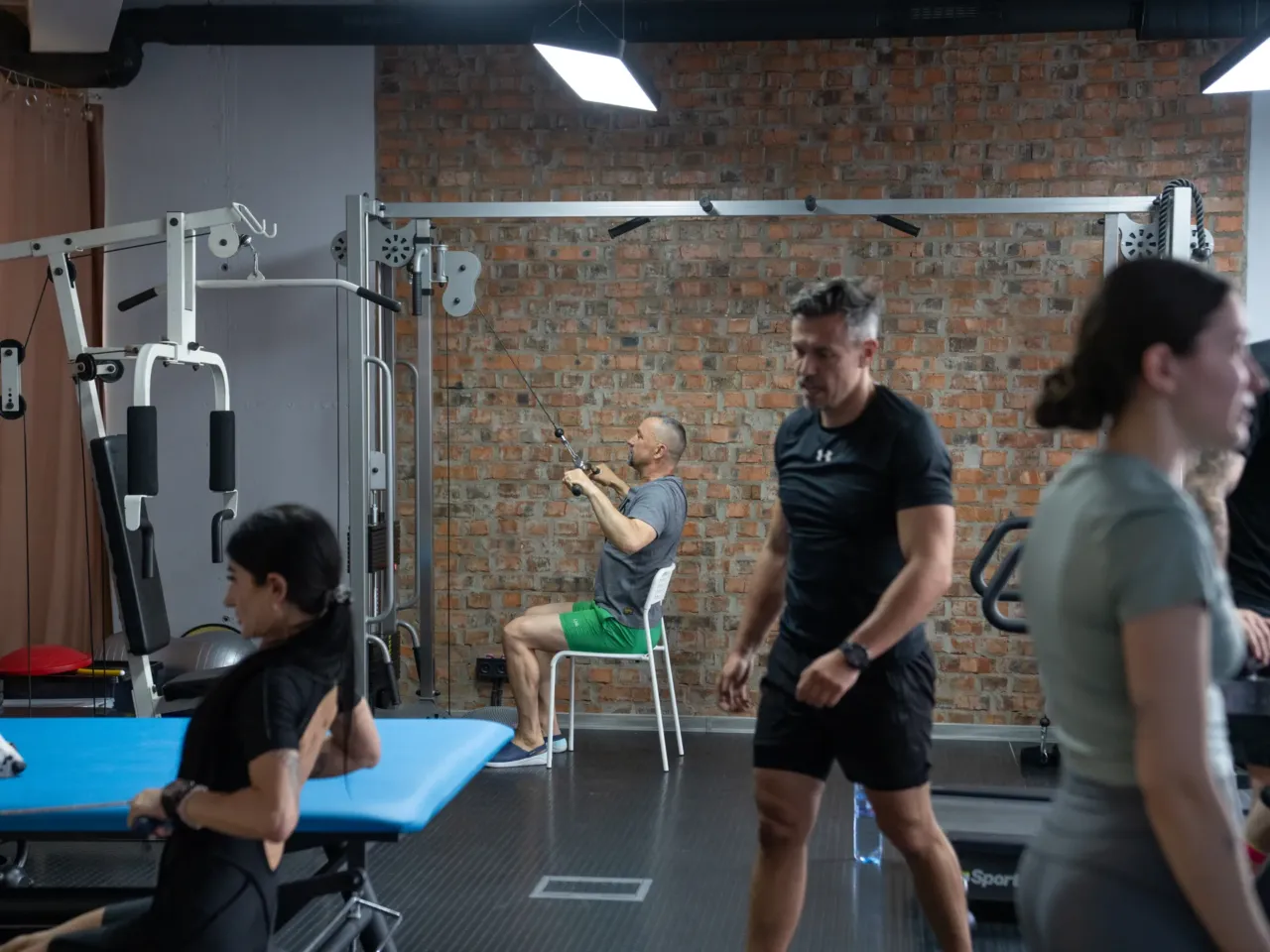 Andriy Khrystiuk exercises during a CrossFit class at the Lviv Habilitation Center where he's staying to recover from mental trauma that he is experiencing as a result of serving in Ukraine's military.